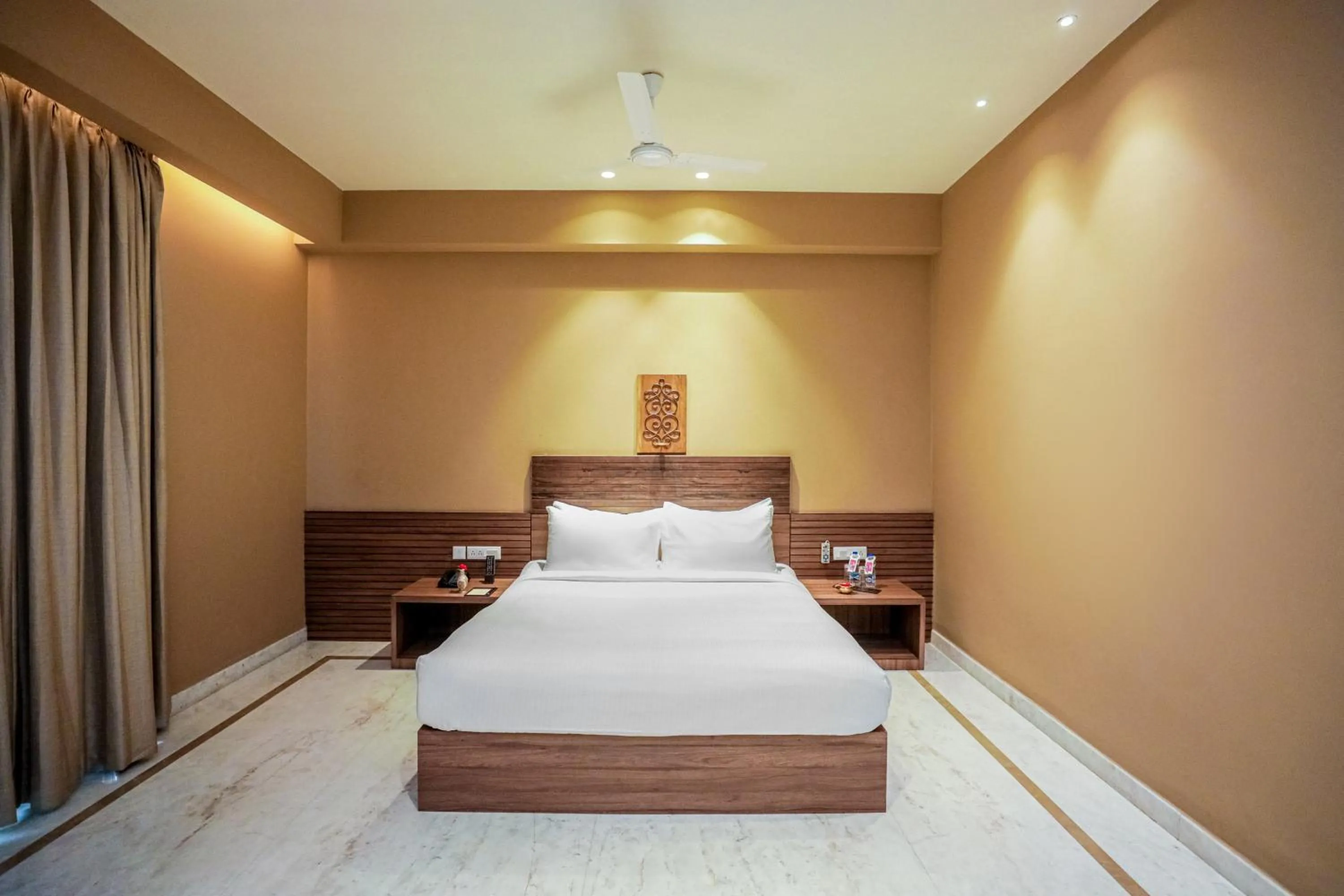 Bed in Gulab Kothi by Royal Orchid Hotels Limited Varanasi