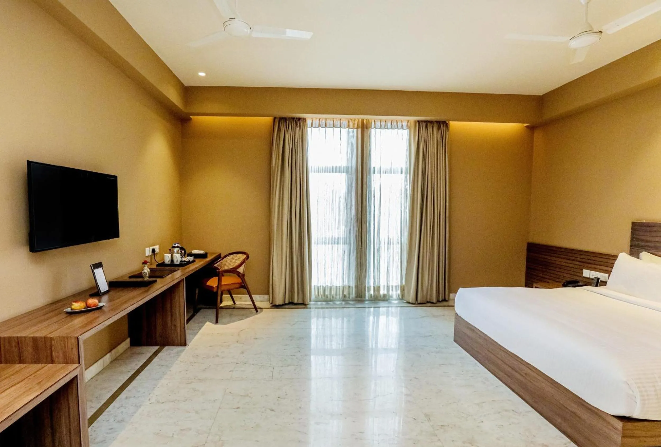 Bed in Gulab Kothi by Royal Orchid Hotels Limited Varanasi