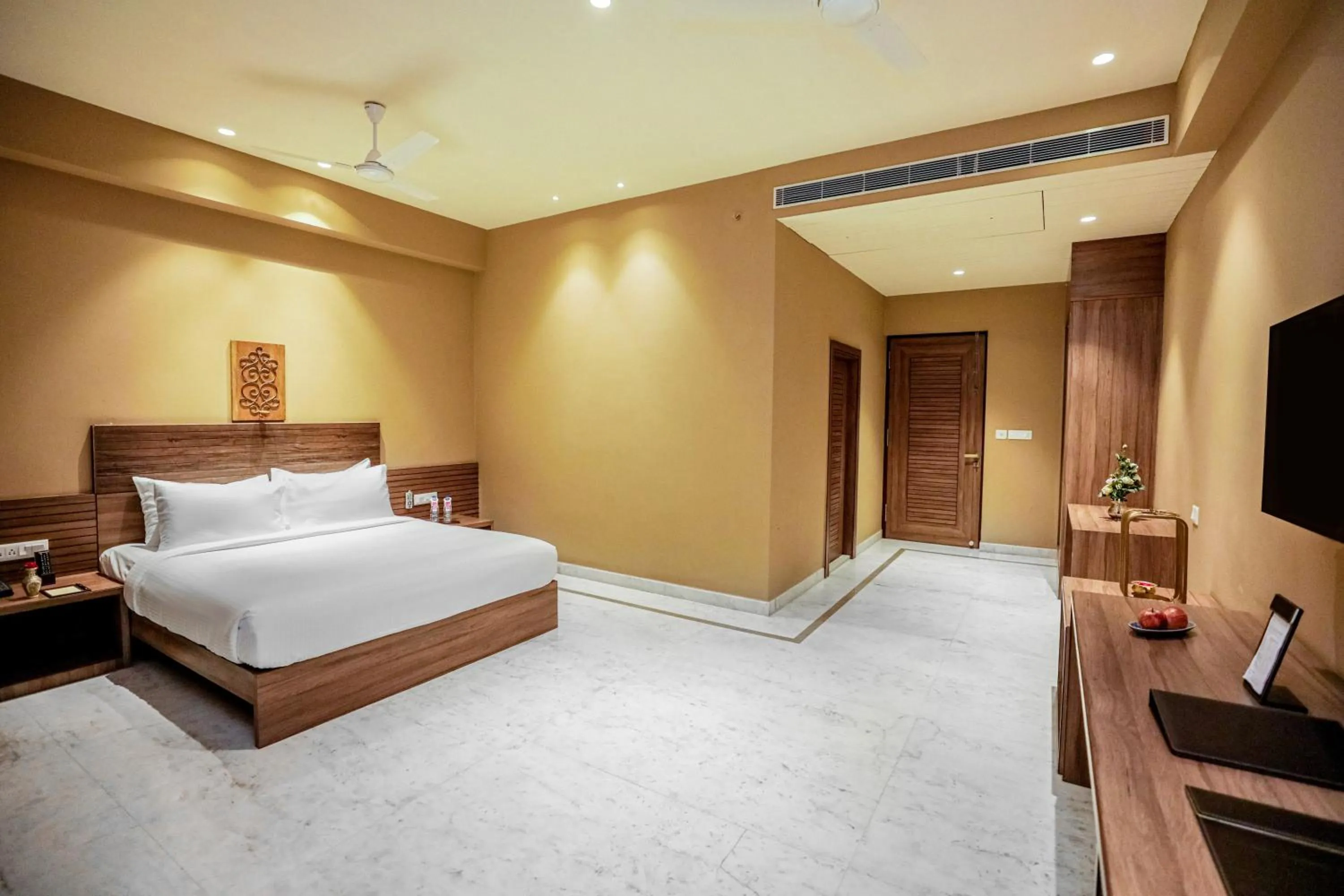 Photo of the whole room, Bed in Gulab Kothi by Royal Orchid Hotels Limited Varanasi