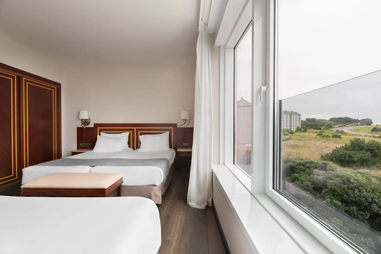 Bed in Eurostars Ciudad de La Coruña