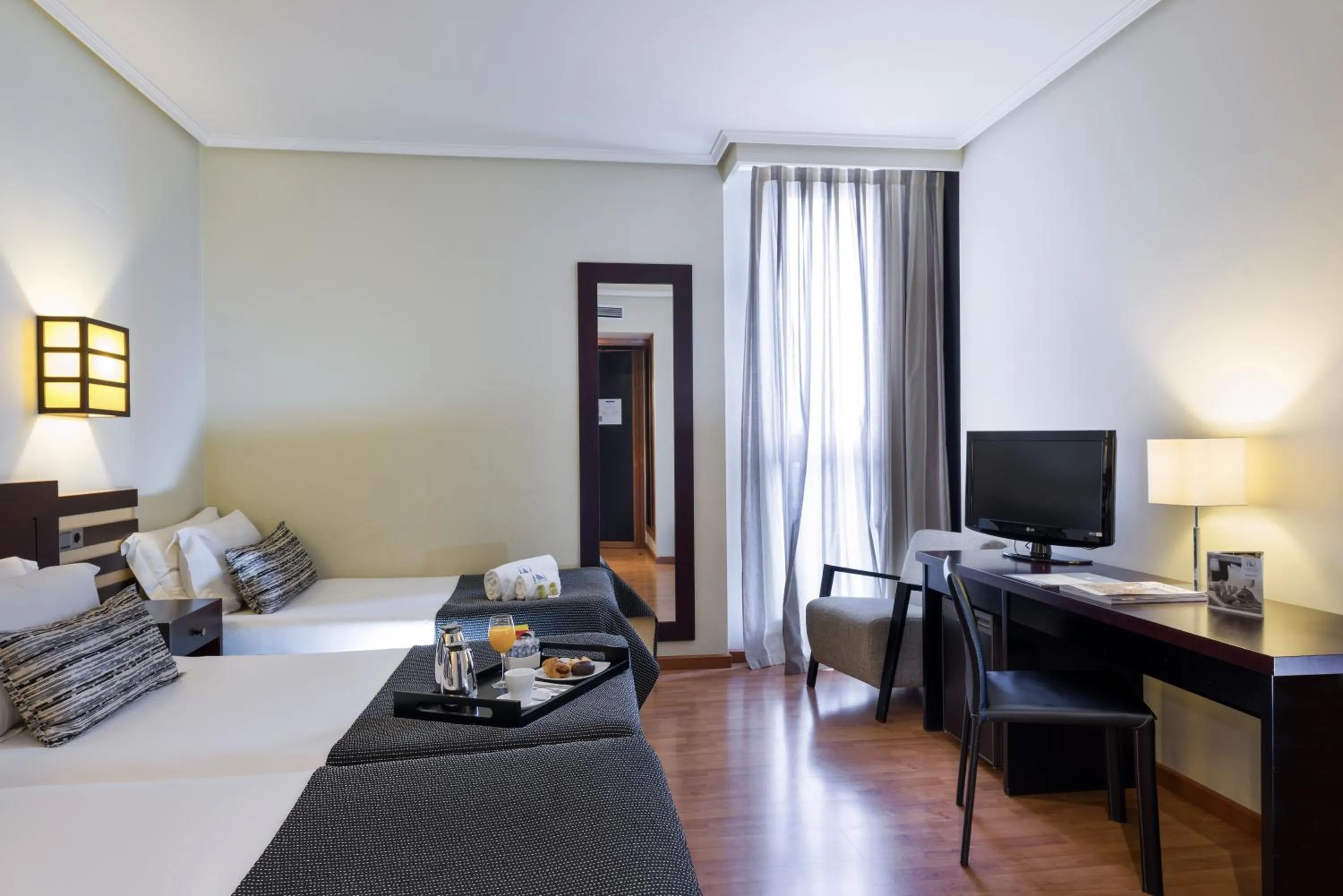 Photo of the whole room, Bed in Exe Auriense