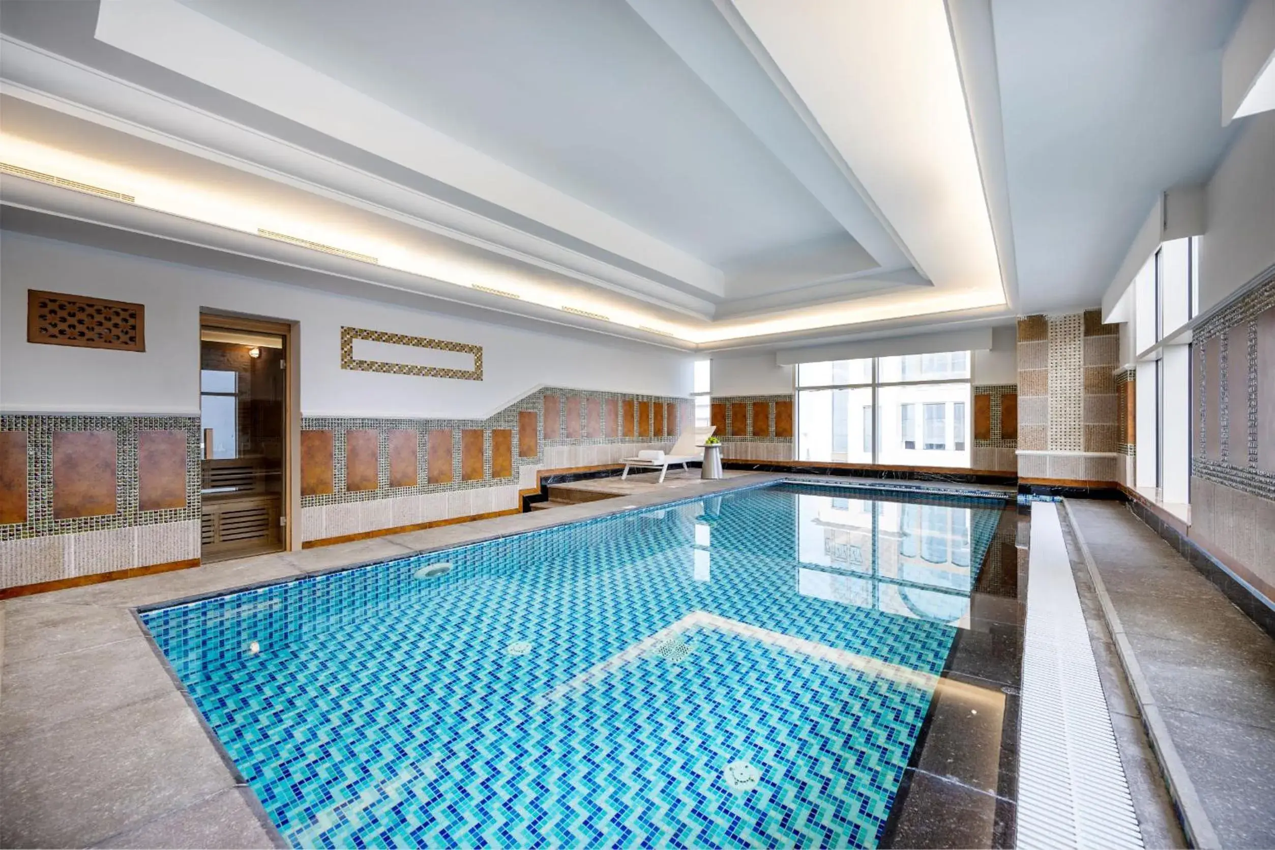 Swimming pool in Dusit Hotel & Suites - Doha Swimming pool in Dusit Hotel & Suites - Doha