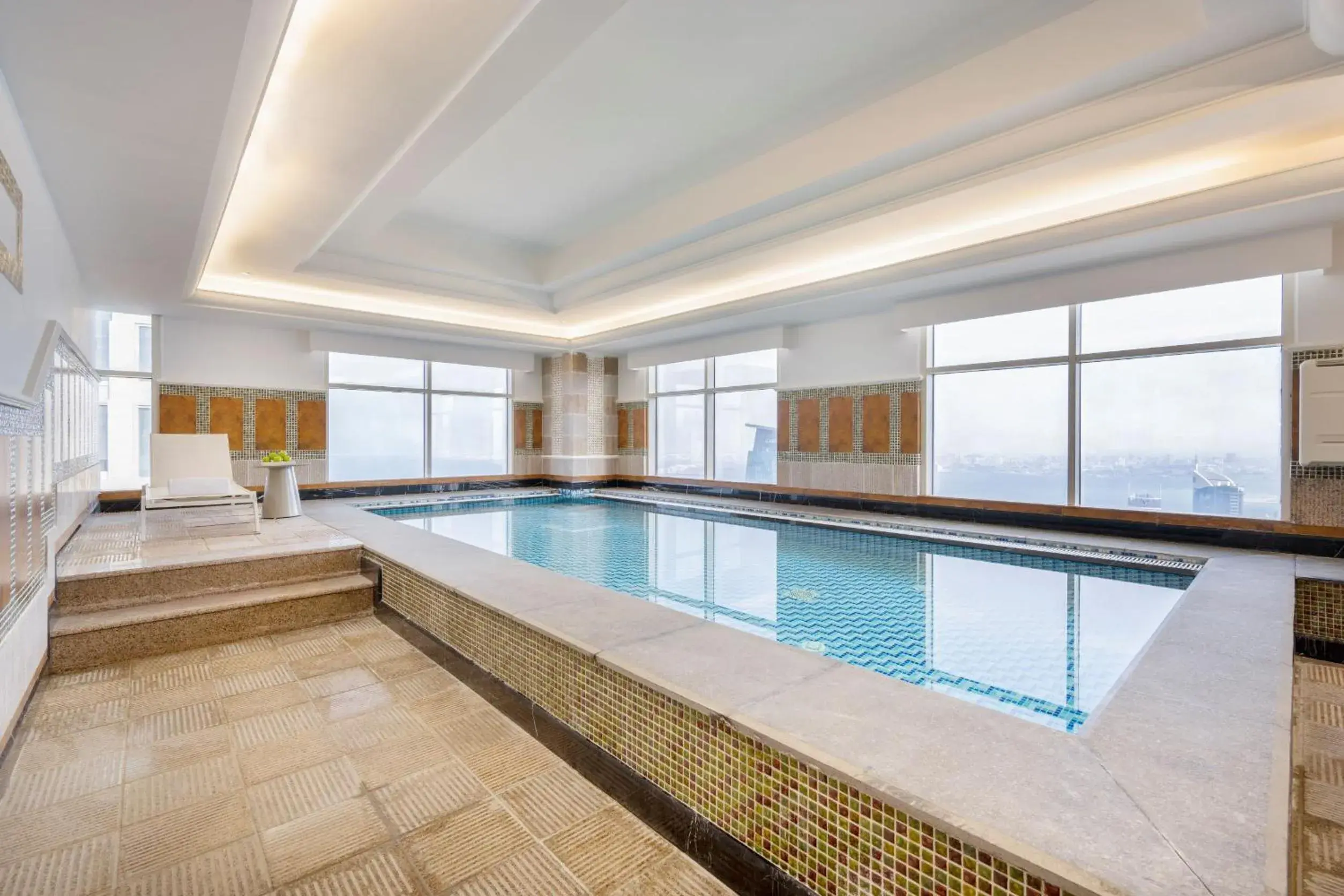 Swimming pool in Dusit Hotel & Suites - Doha Swimming pool in Dusit Hotel & Suites - Doha