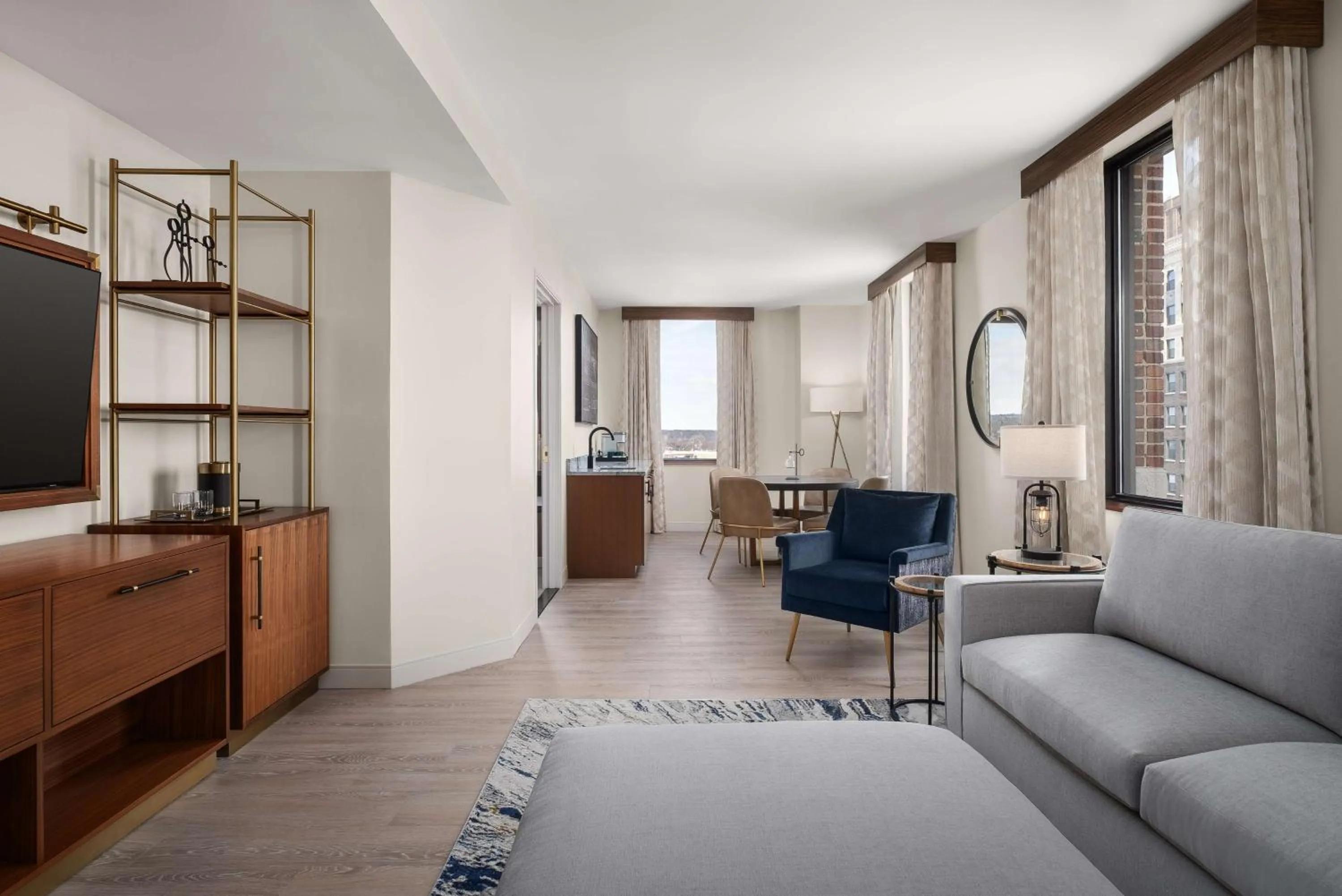 Living room in Hotel Ardent Dayton Downtown, Tapestry Collection By Hilton