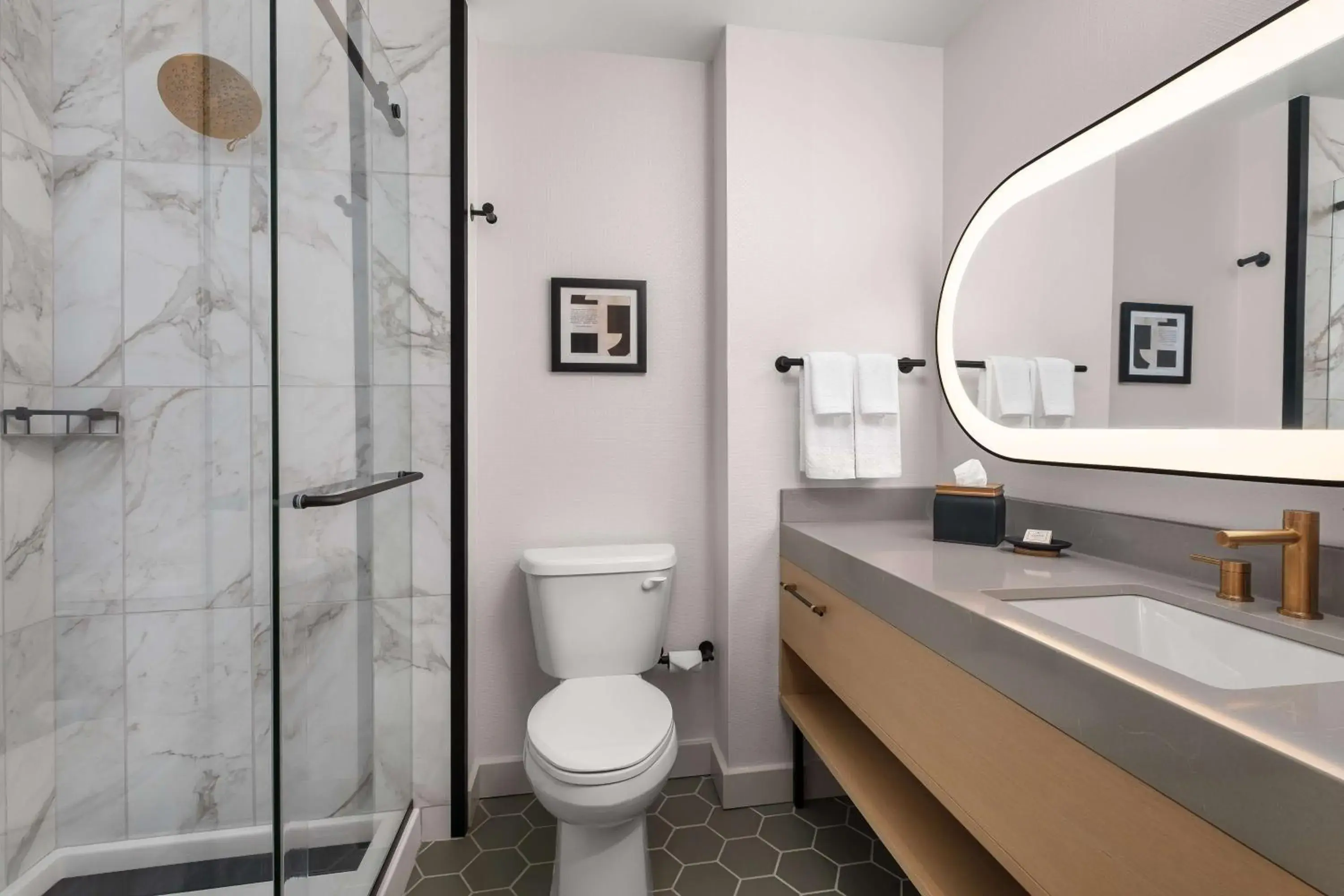 Bathroom in Hotel Ardent Dayton Downtown, Tapestry Collection By Hilton Bathroom in Hotel Ardent Dayton Downtown, Tapestry Collection By Hilton