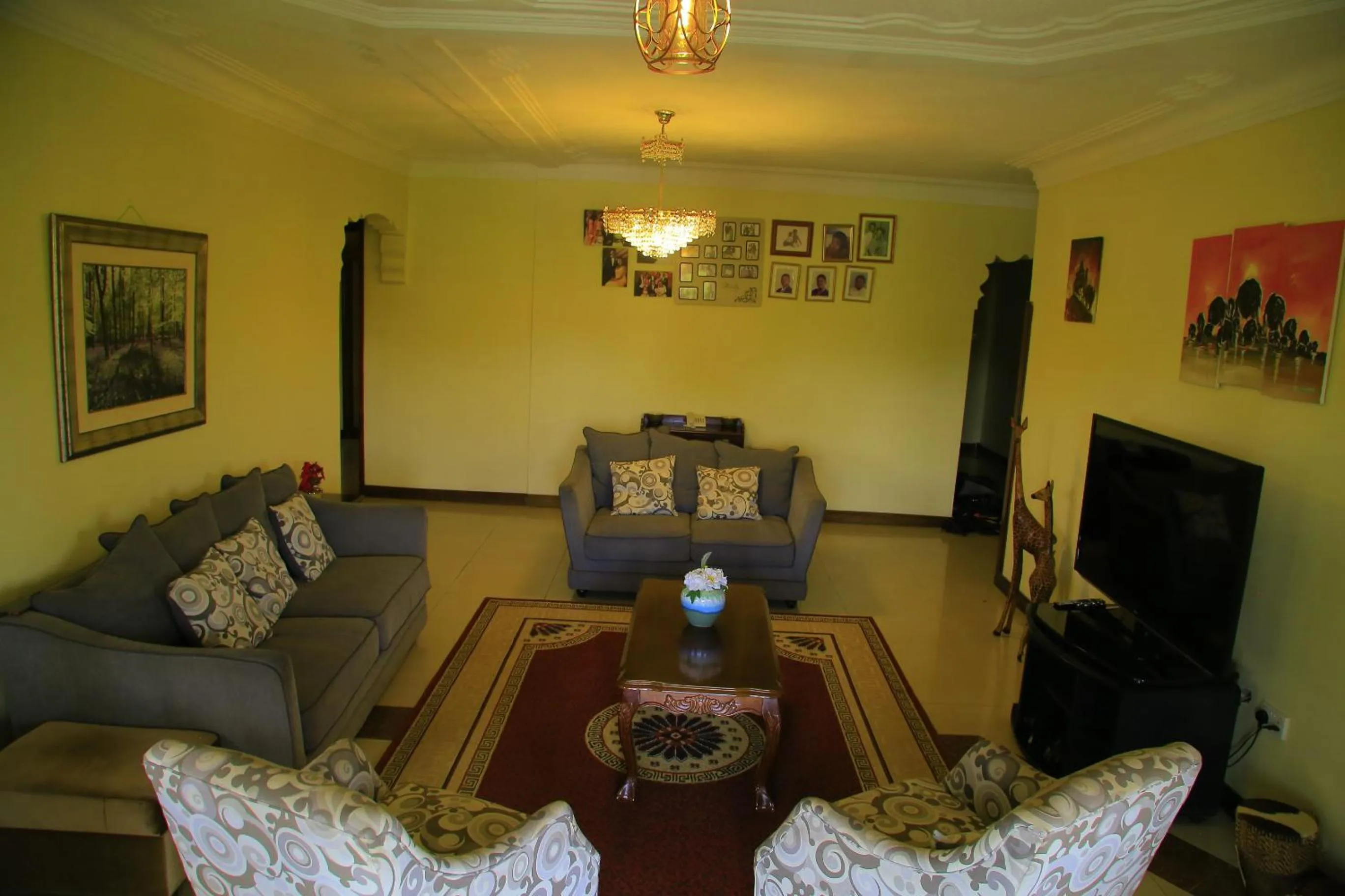 Communal lounge/ TV room in Royal Victoria House Ltd