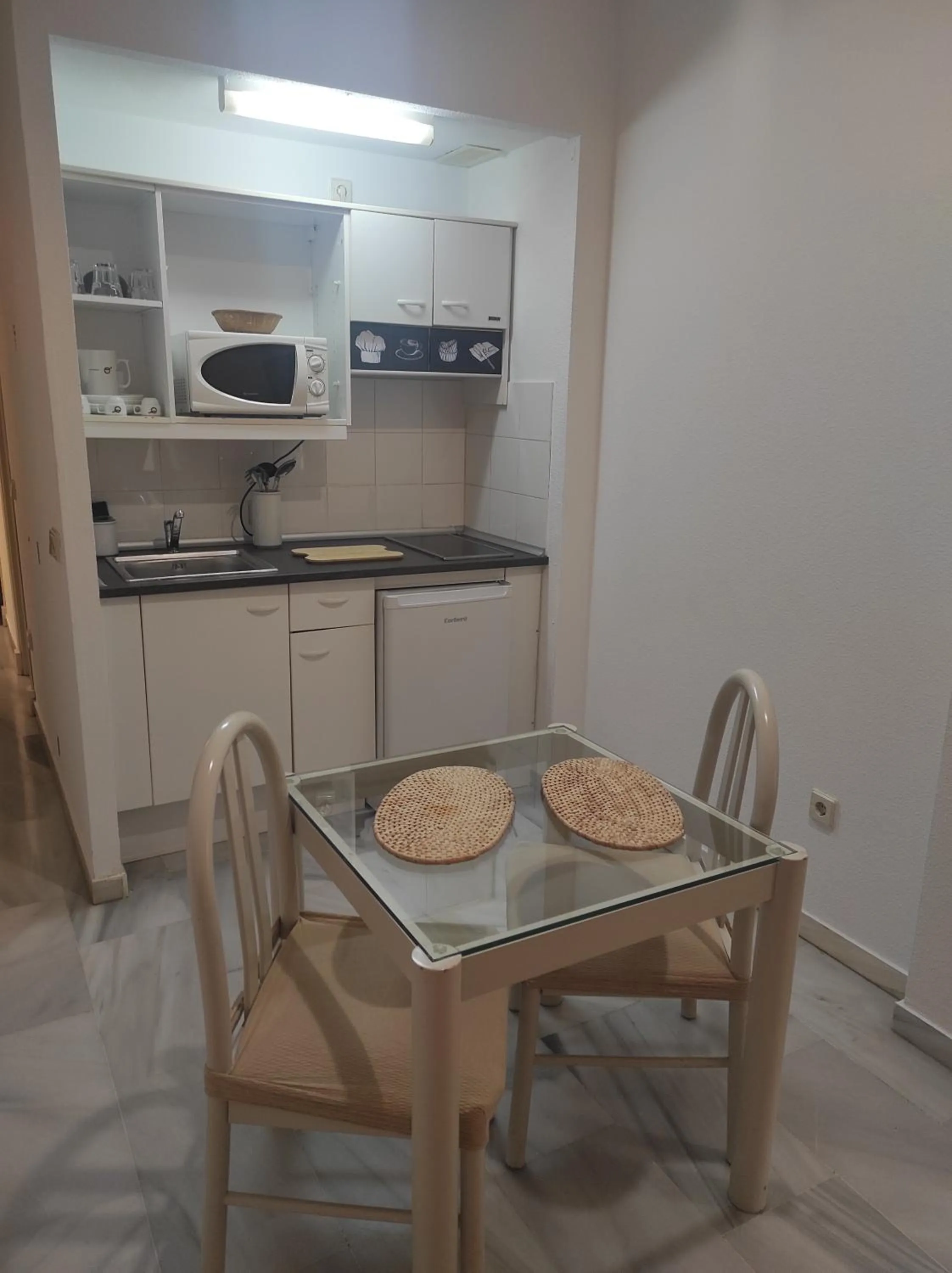 kitchen in Hospedium Hotel Apartamentos Simón Verde