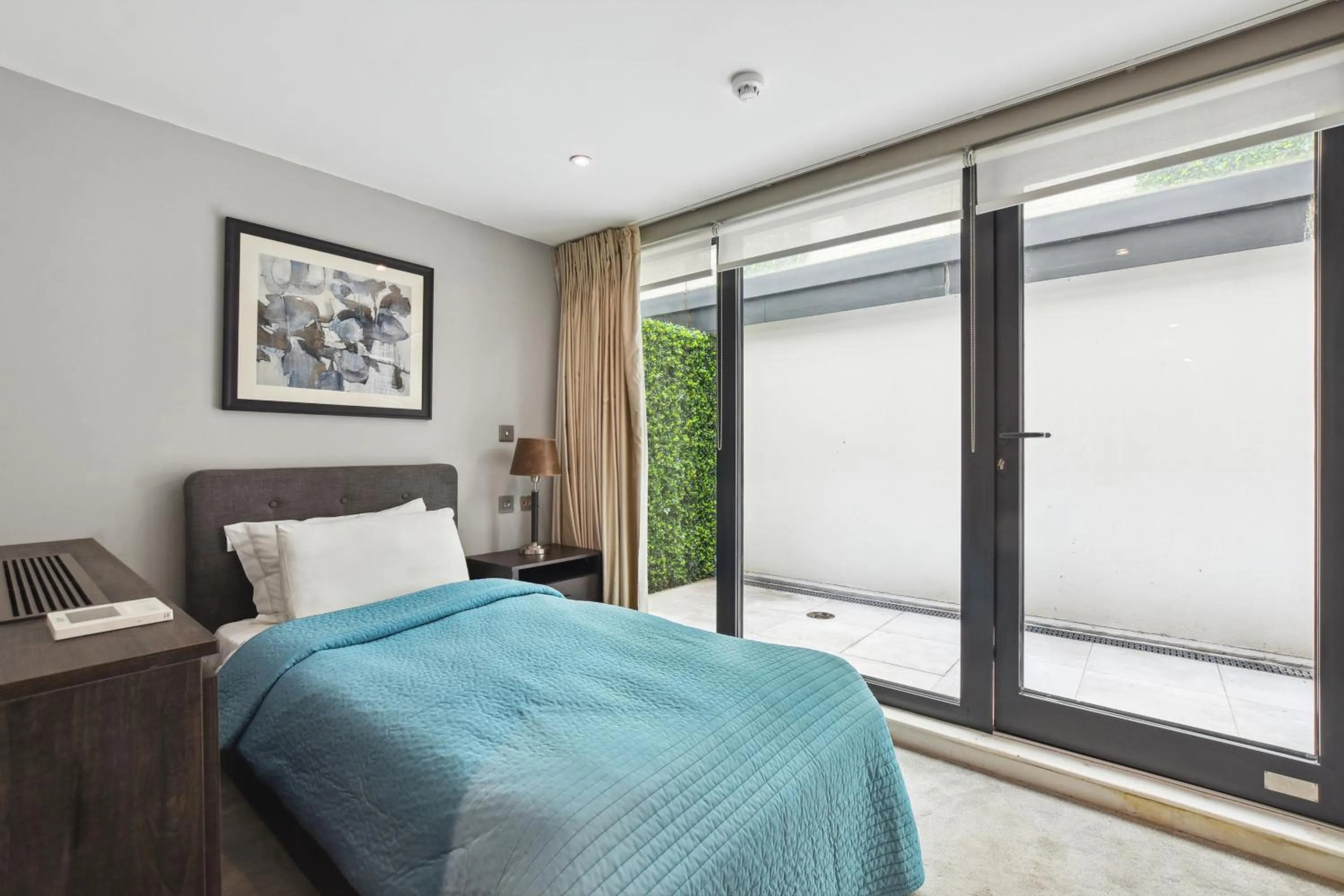 Bed in Buckingham Palace Residences by Aeria Apartments