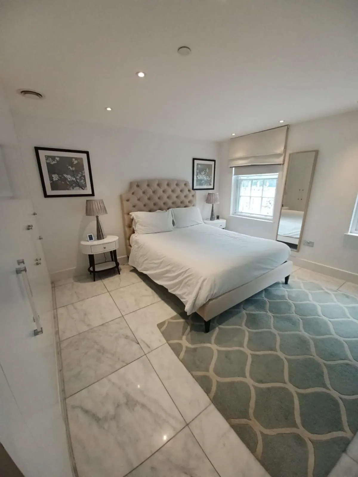 Bed in Buckingham Palace Residences by Aeria Apartments