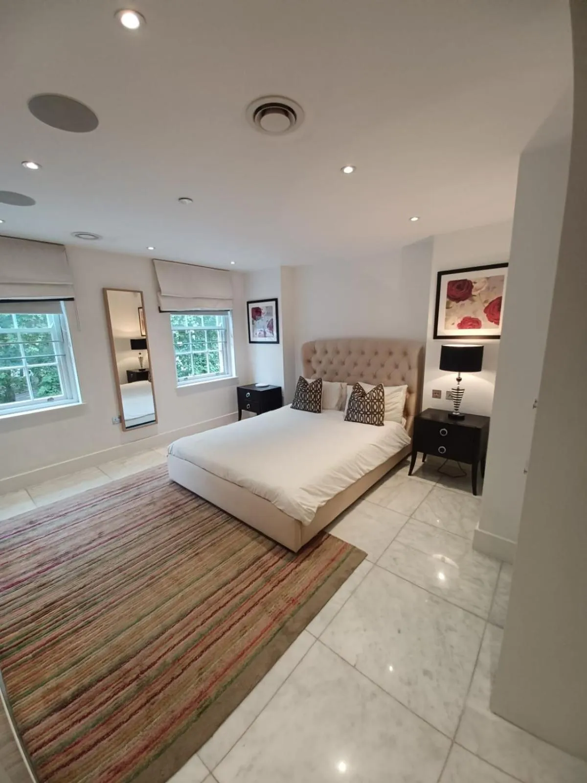 Bed in Buckingham Palace Residences by Aeria Apartments