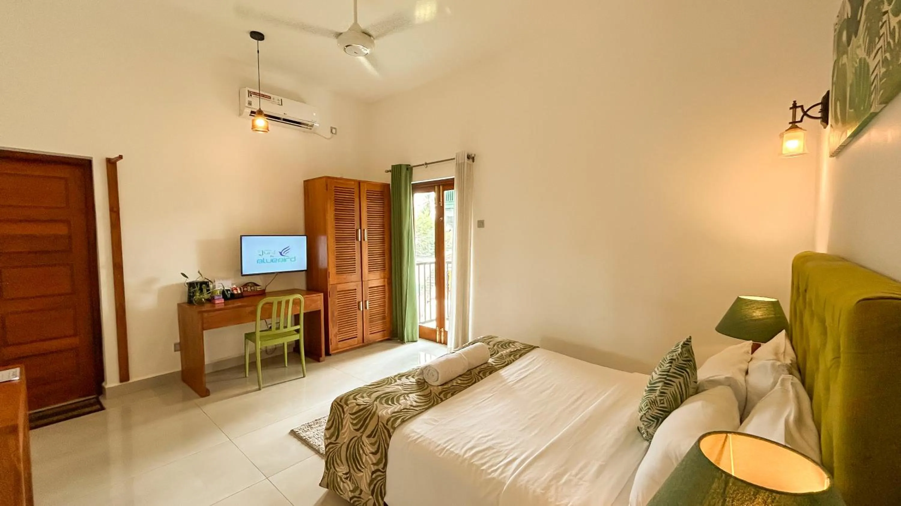 Bed in J leaf Hotel by Blue Bird