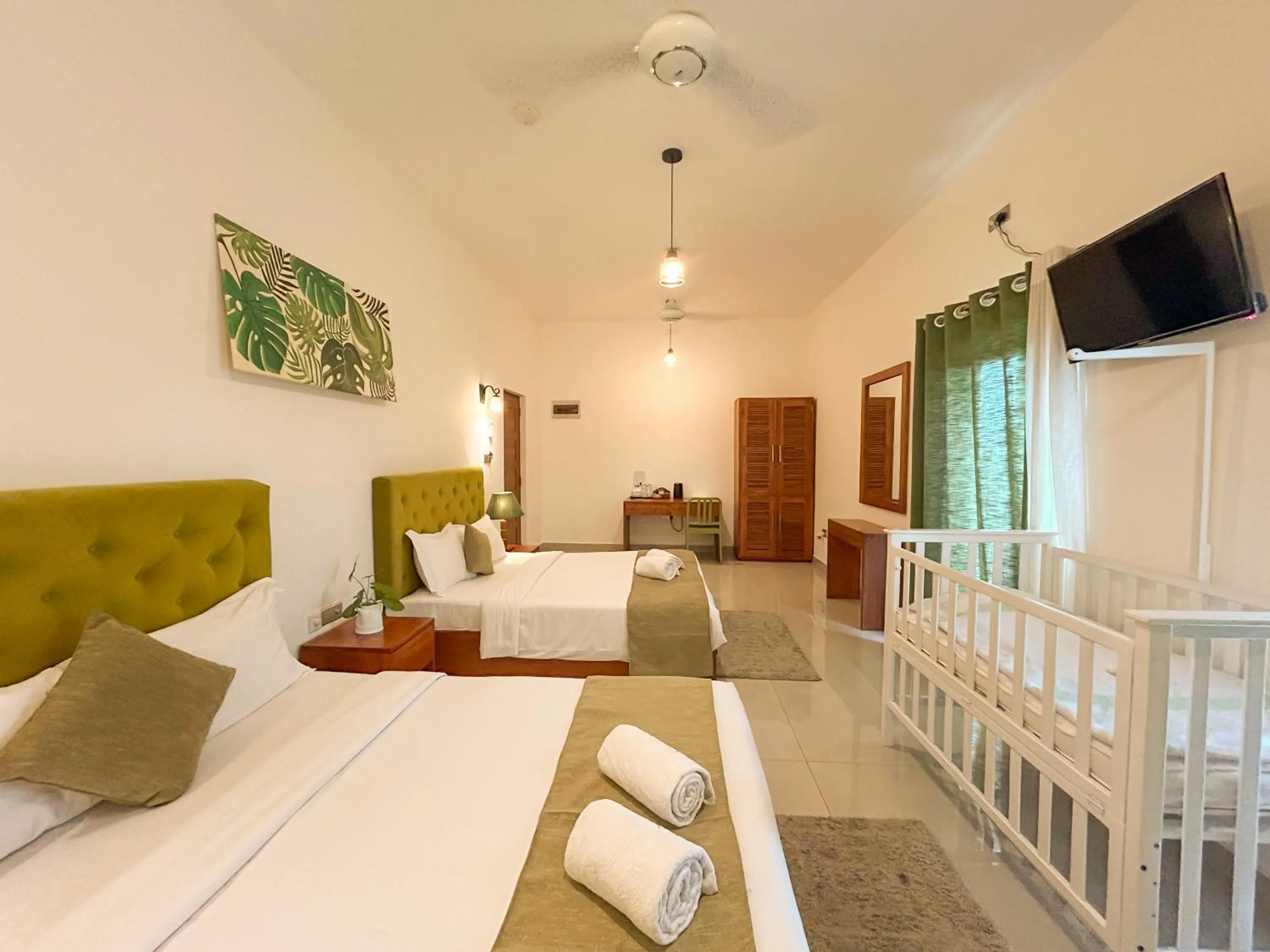 Bed in J leaf Hotel by Blue Bird