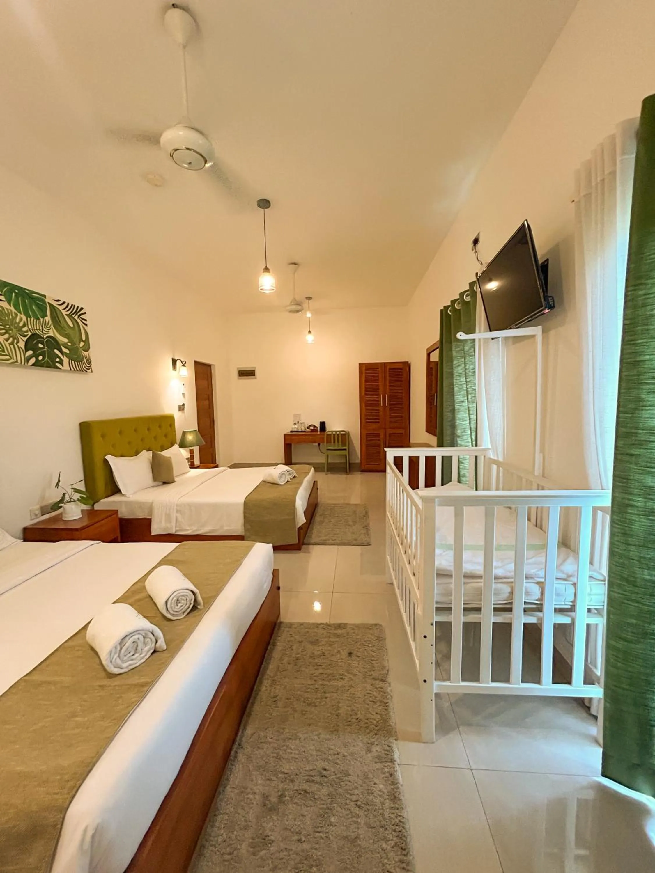 Bed in J leaf Hotel by Blue Bird