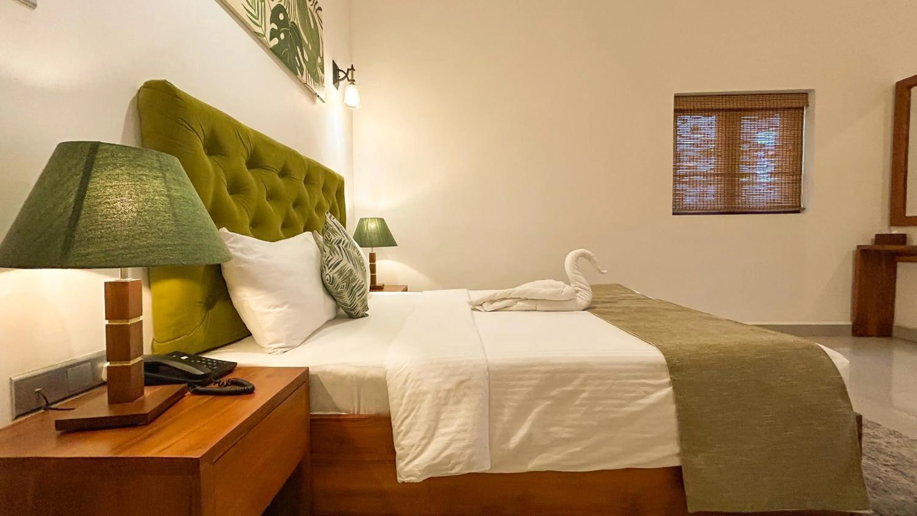 Bed in J leaf Hotel by Blue Bird