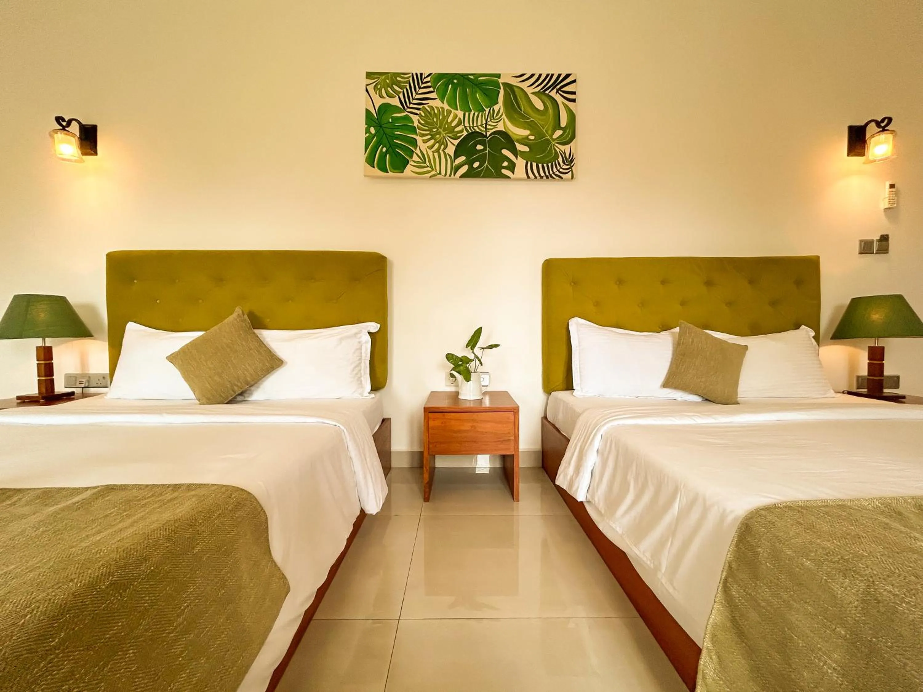 Bed in J leaf Hotel by Blue Bird