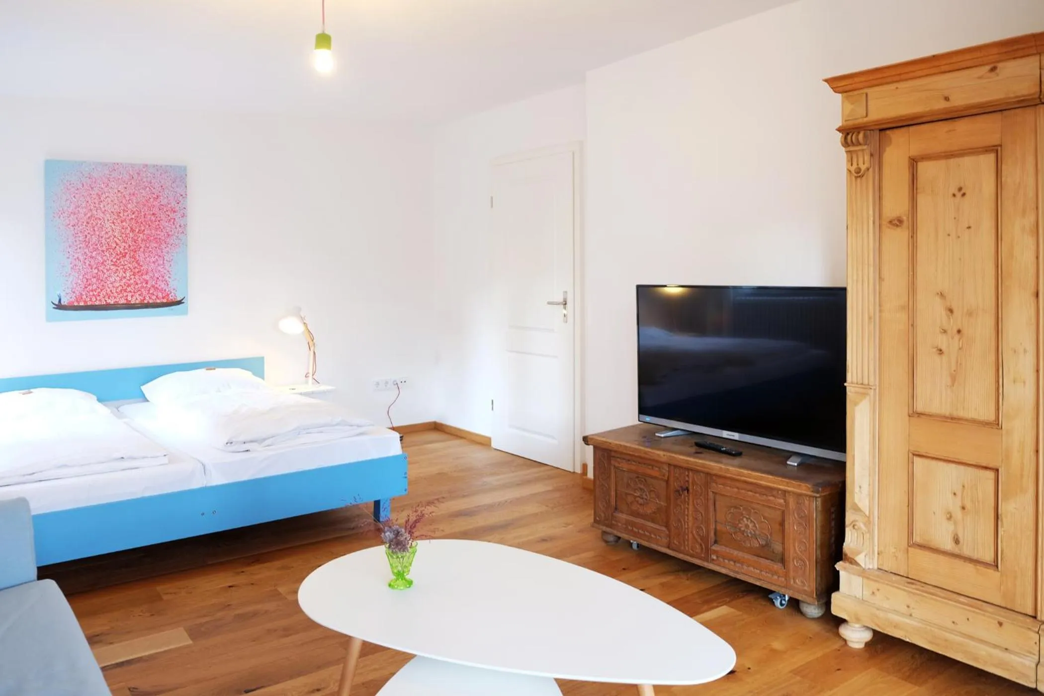 Living room, Bed in Hotel Maurerhansl