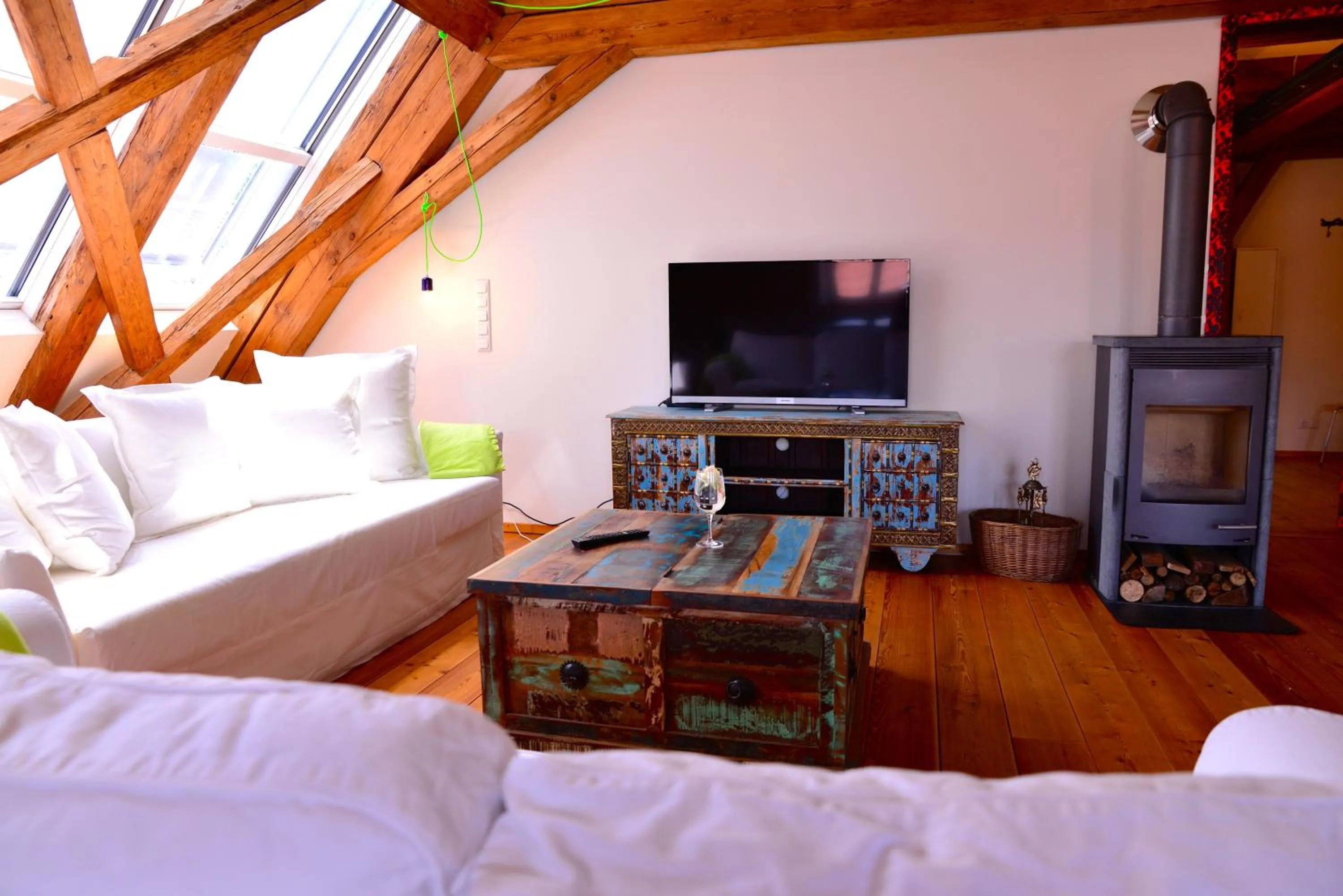 Living room, Bed in Hotel Maurerhansl