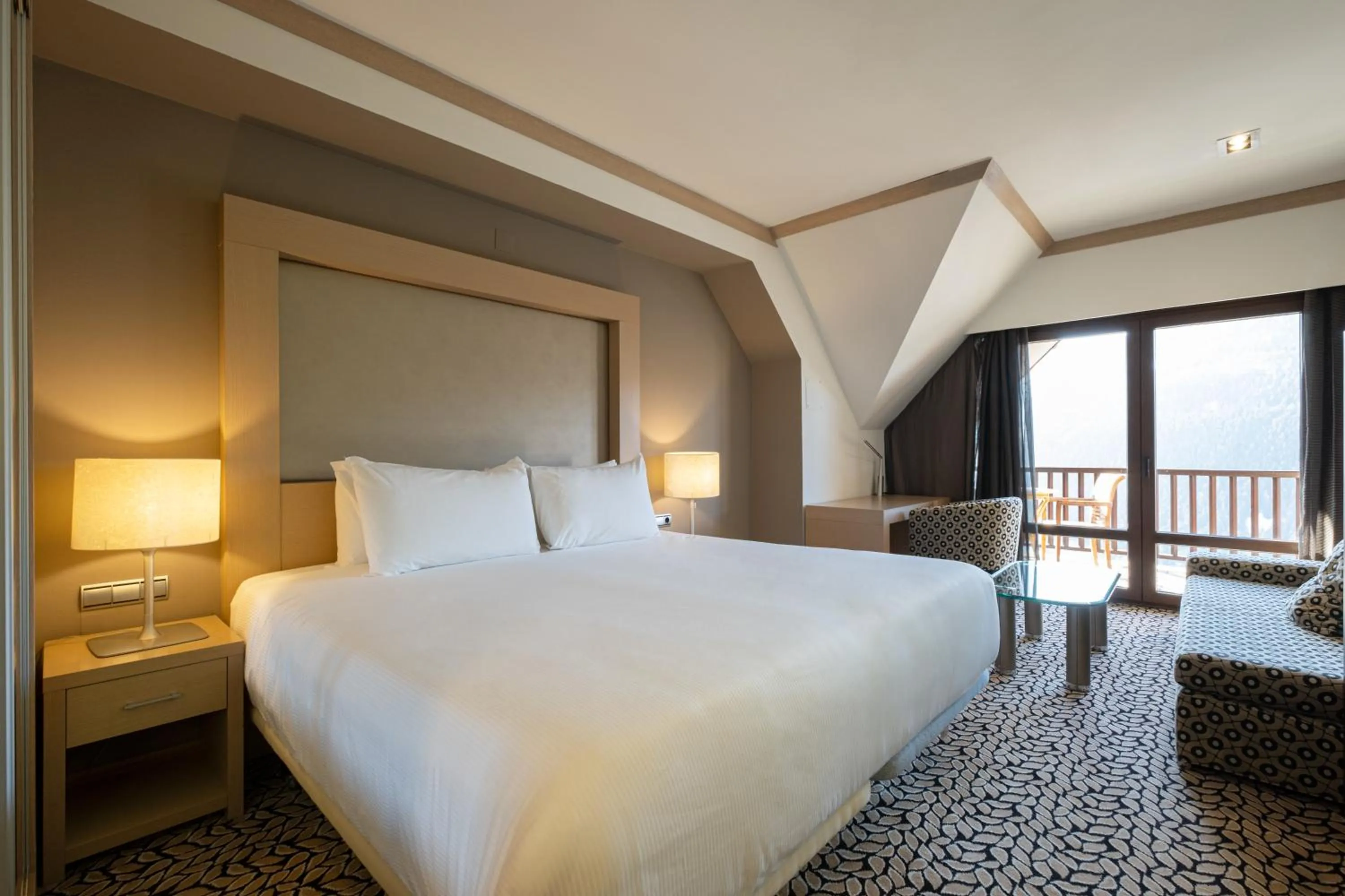 Bed in Eurostars Royal Tanau