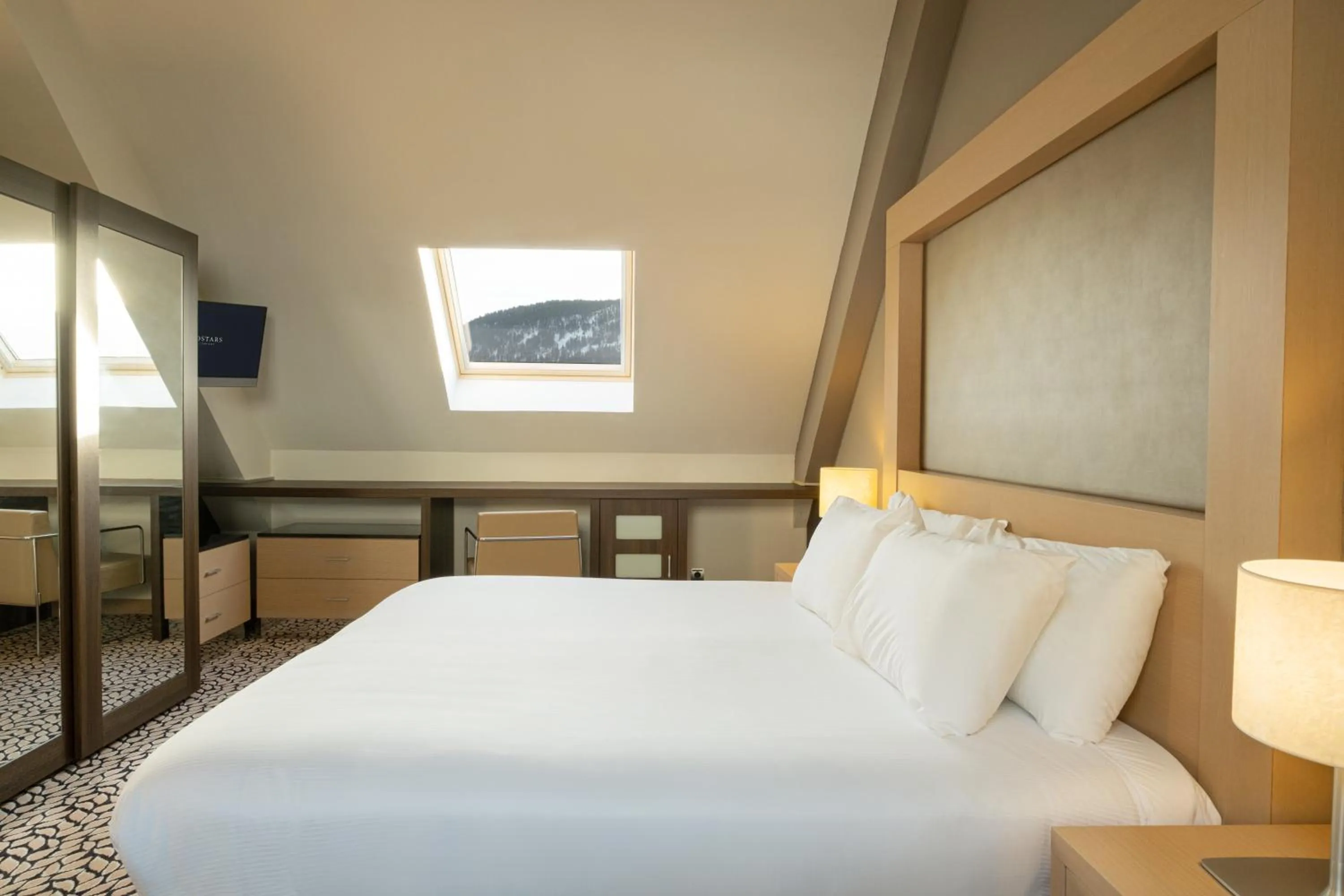 Bed in Eurostars Royal Tanau