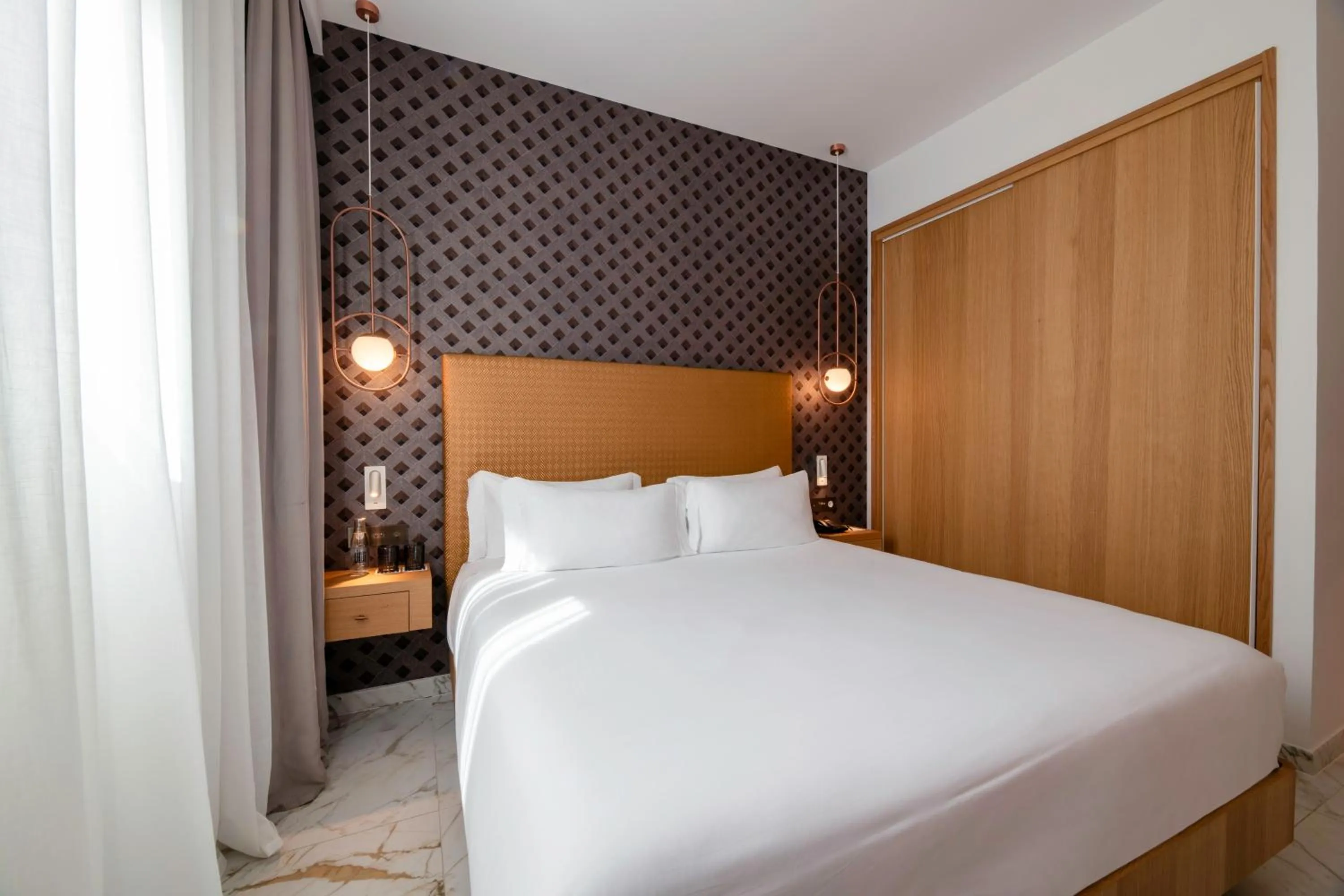 Bed in UMusic Hotel Madrid