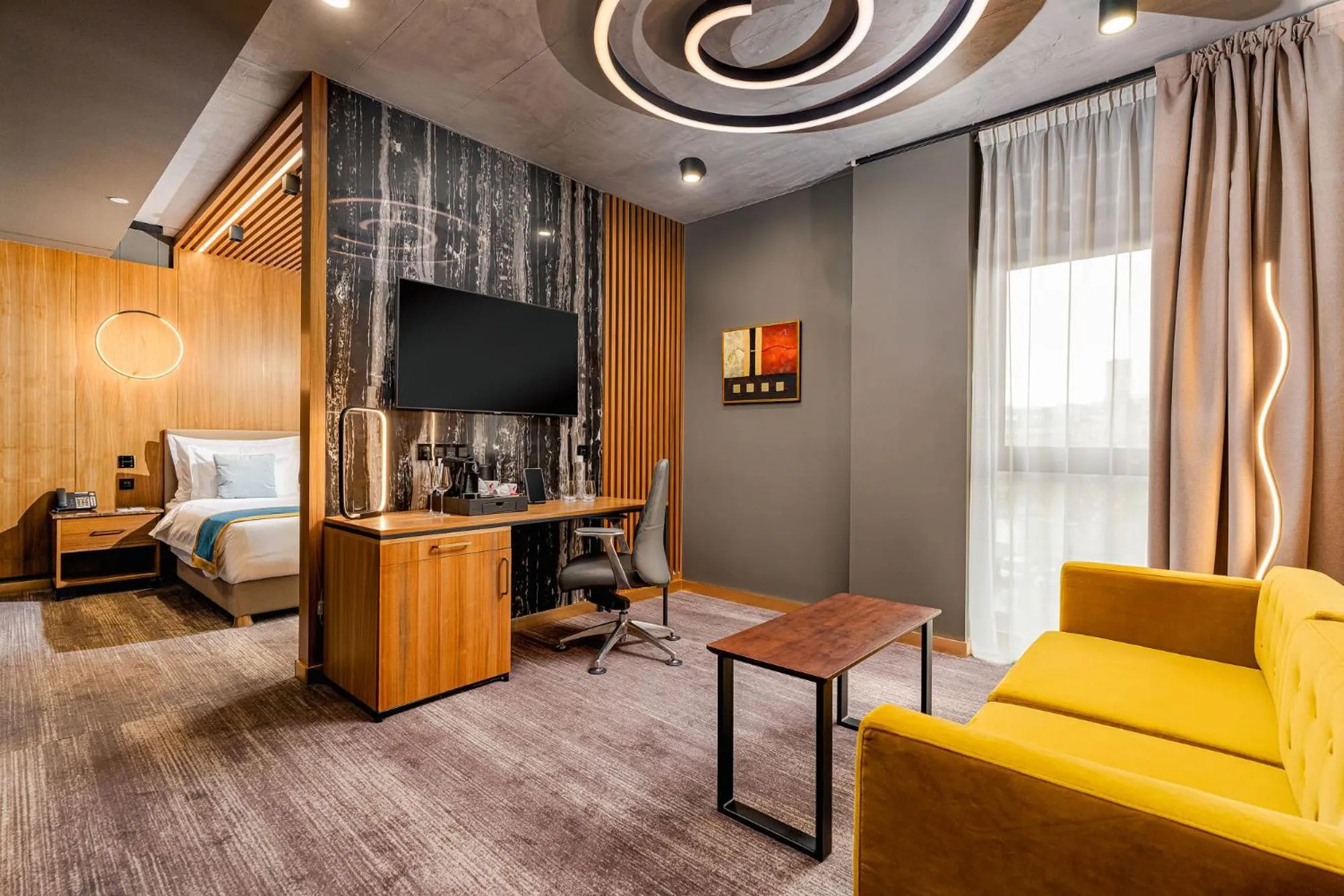 Communal lounge/ TV room, Bed in Hotel Vibre