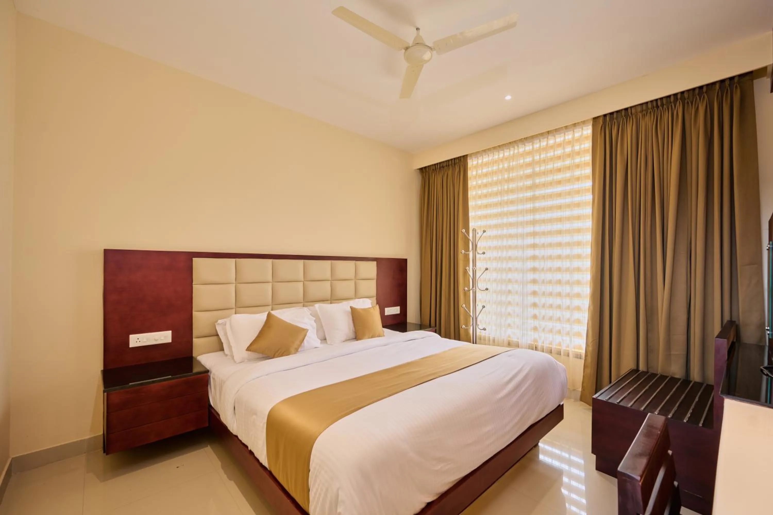Photo of the whole room, Bed in Thekkady Gavi Suites