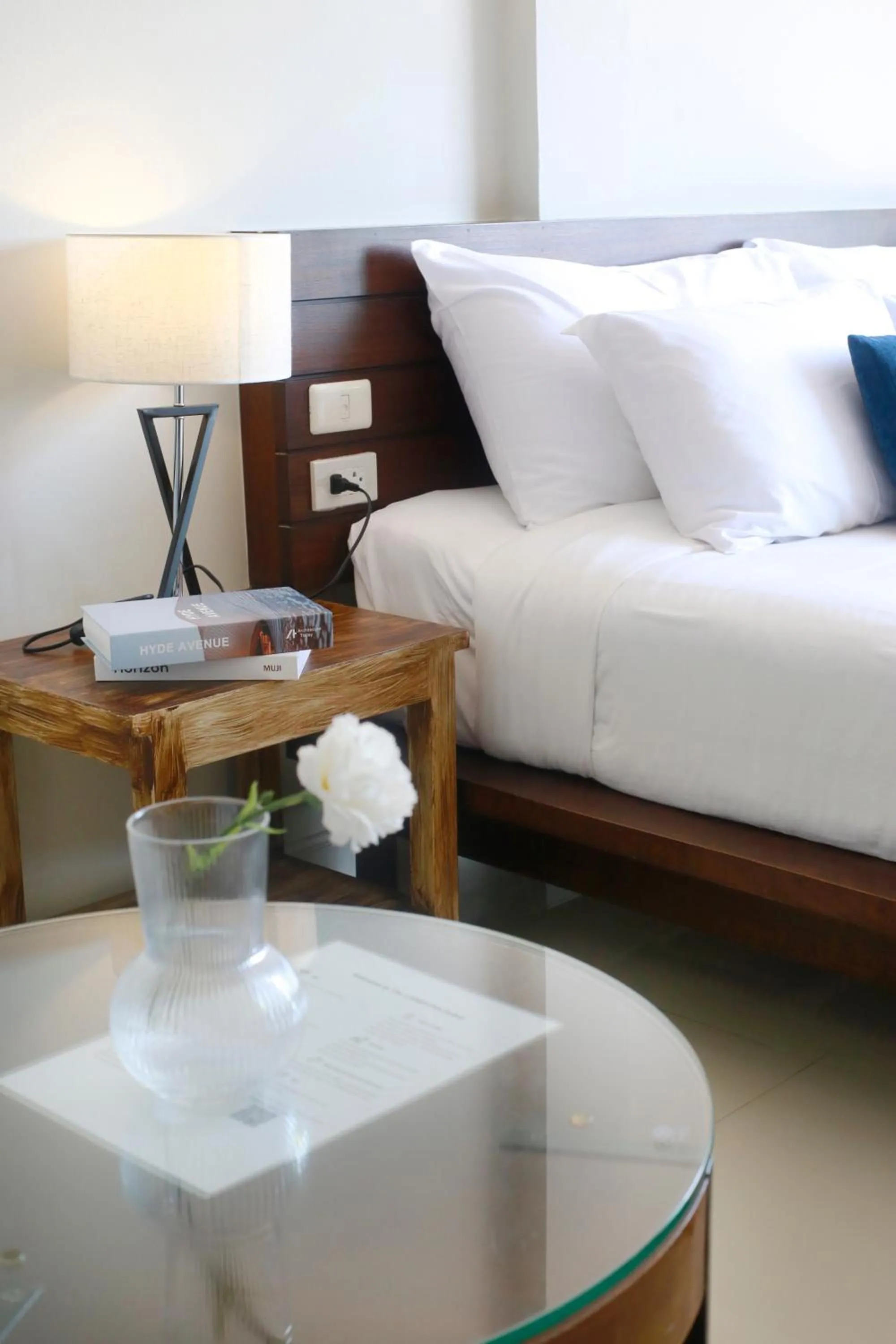 Bed in The Langstan Suites