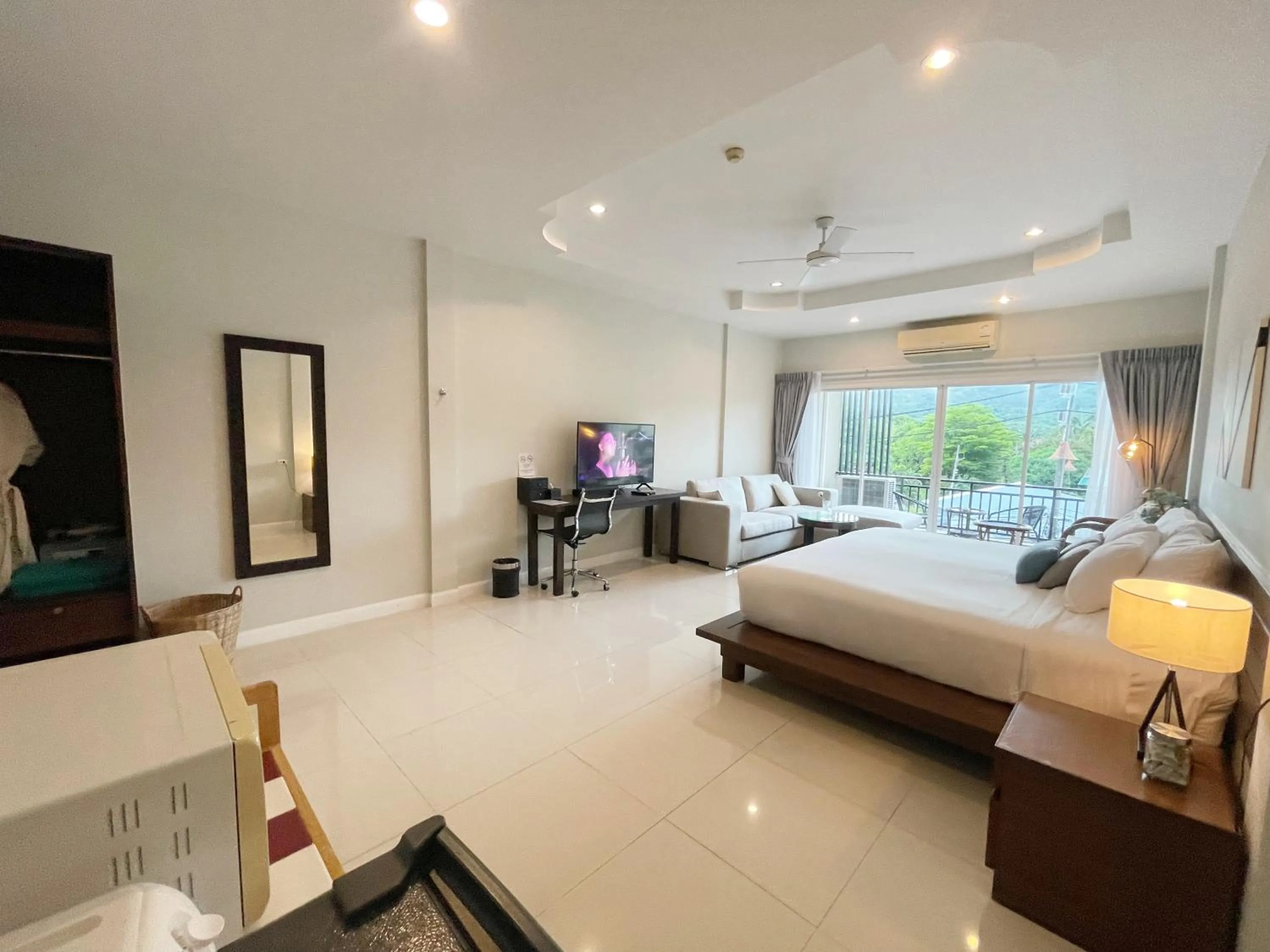 Bed in The Langstan Suites