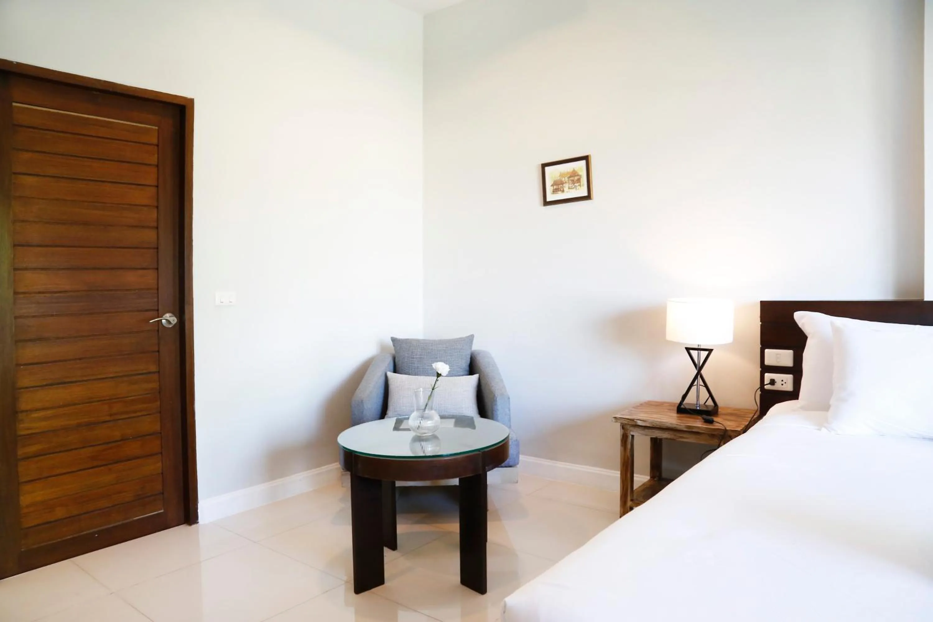 Bed in The Langstan Suites