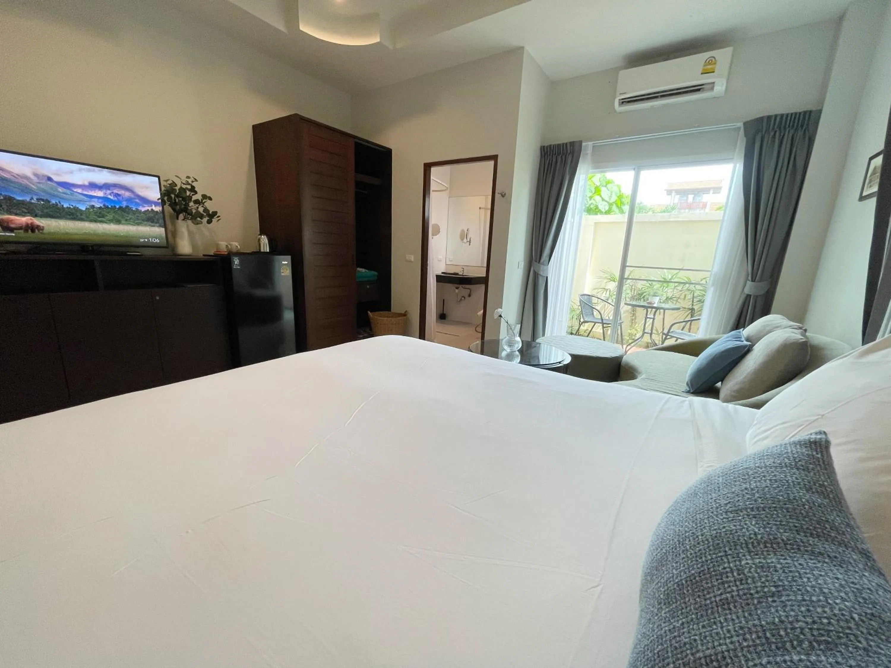 Bed in The Langstan Suites