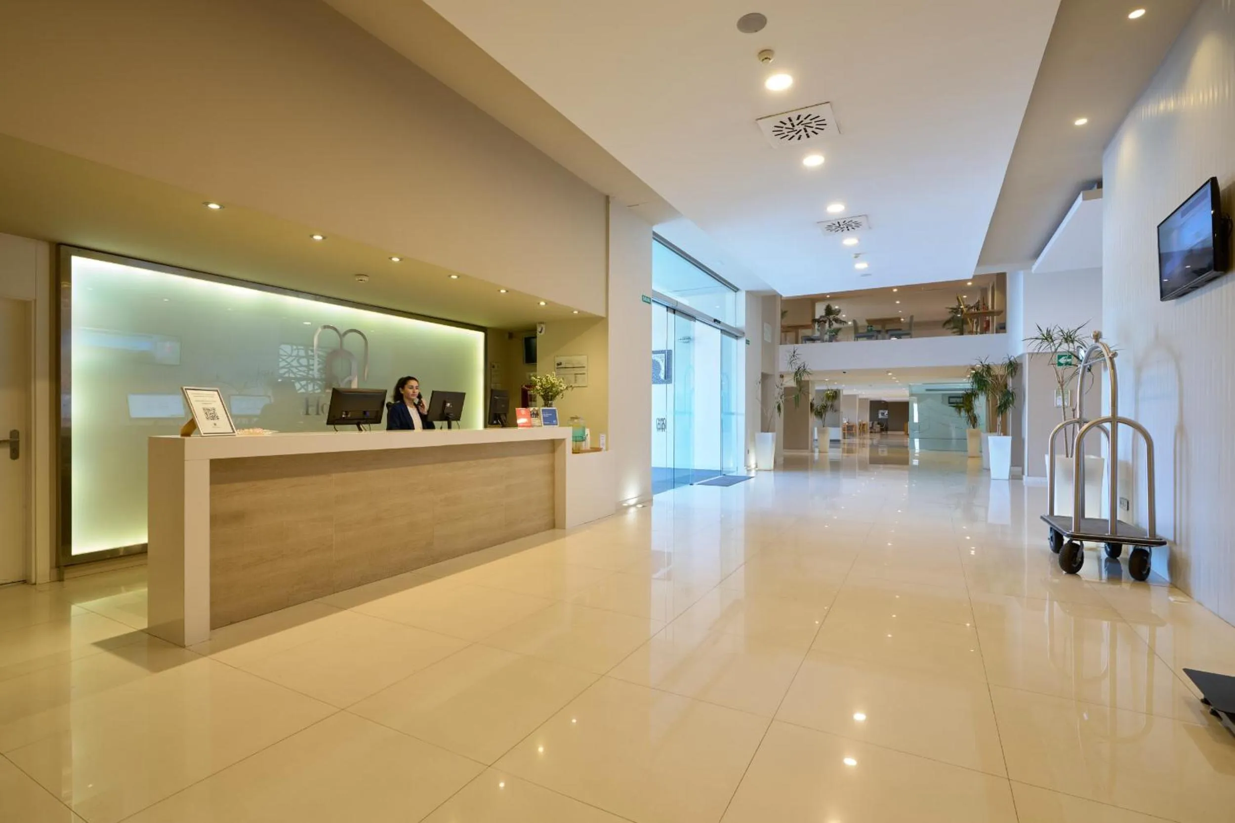 Lobby or reception in M.A. Hotel Sevilla Congresos