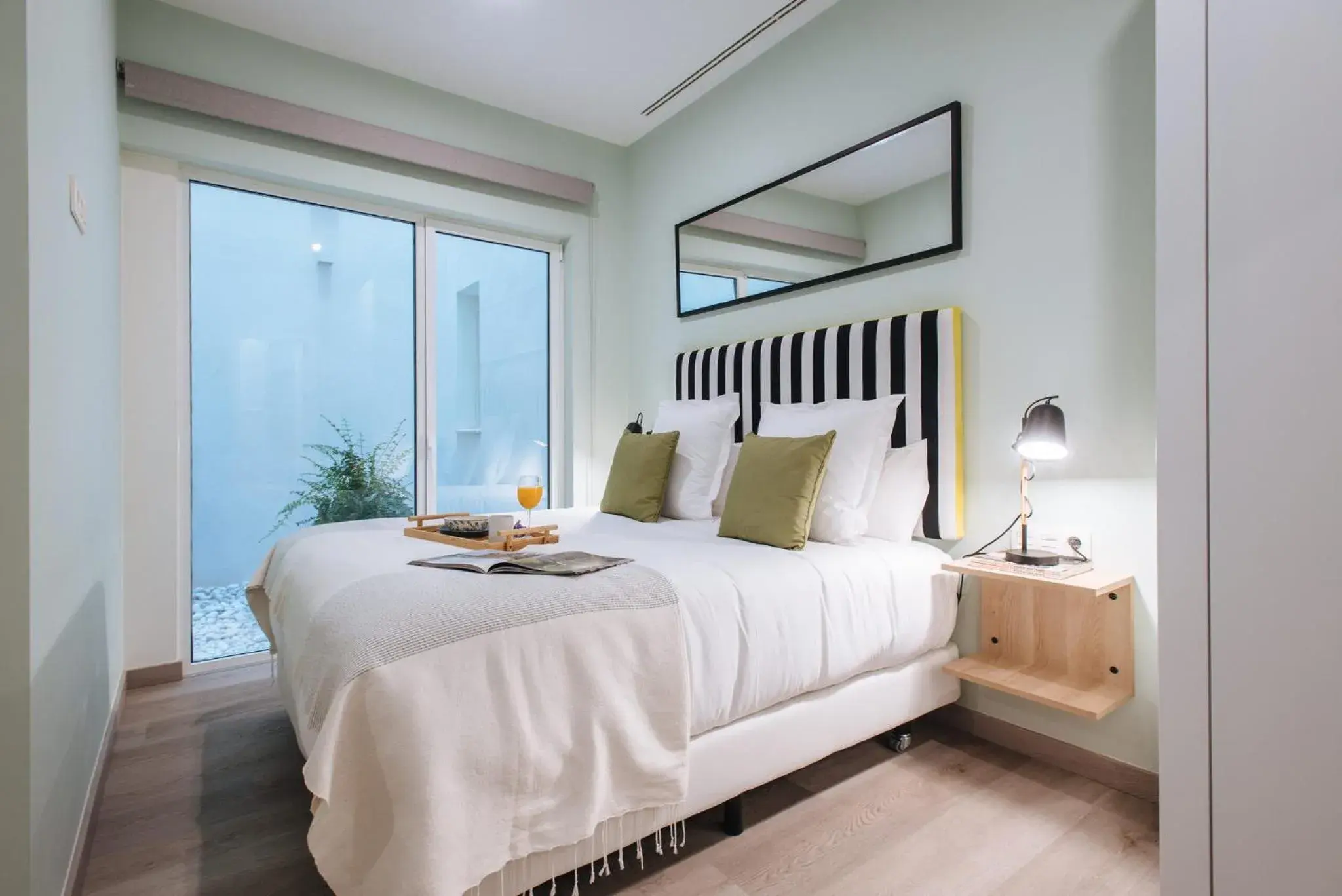 Bedroom, Bed in Sercotel Sevilla Guadalquivir Suites Bedroom, Bed in Sercotel Sevilla Guadalquivir Suites