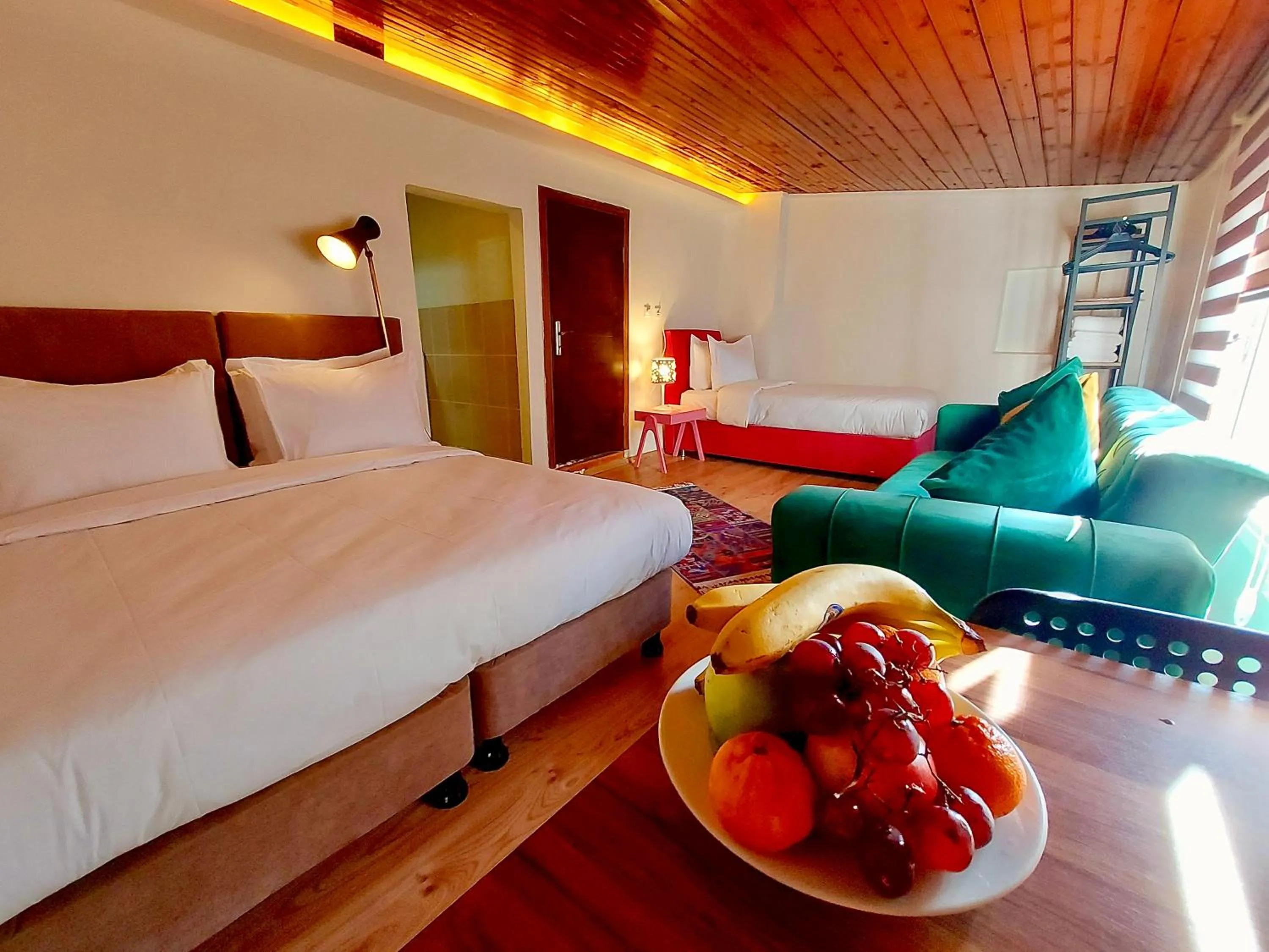 Living room, Bed in Mates Port Hotel