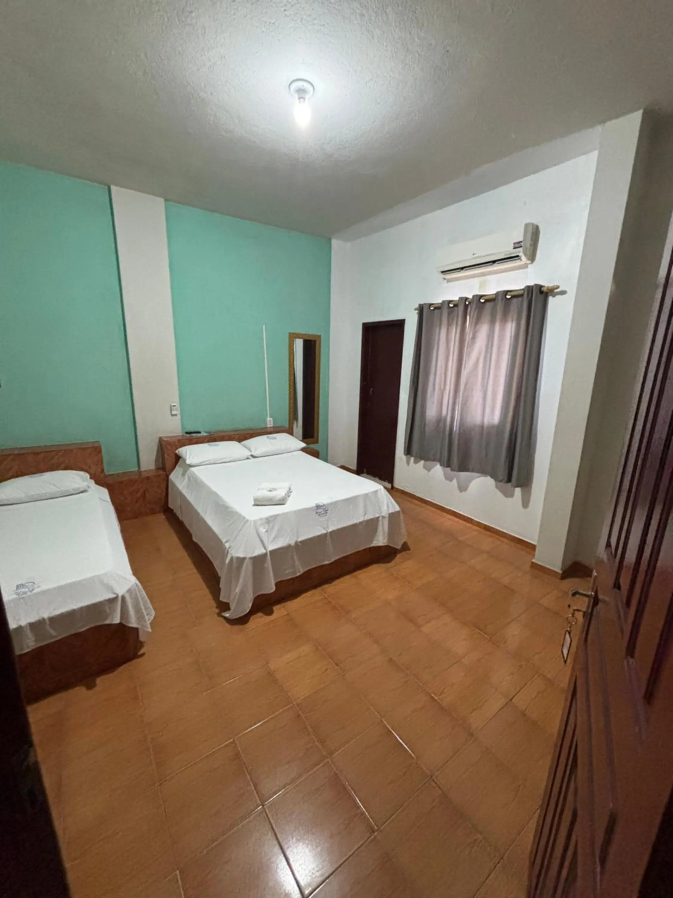 Bed in Hotel Chalé Ji-Parana