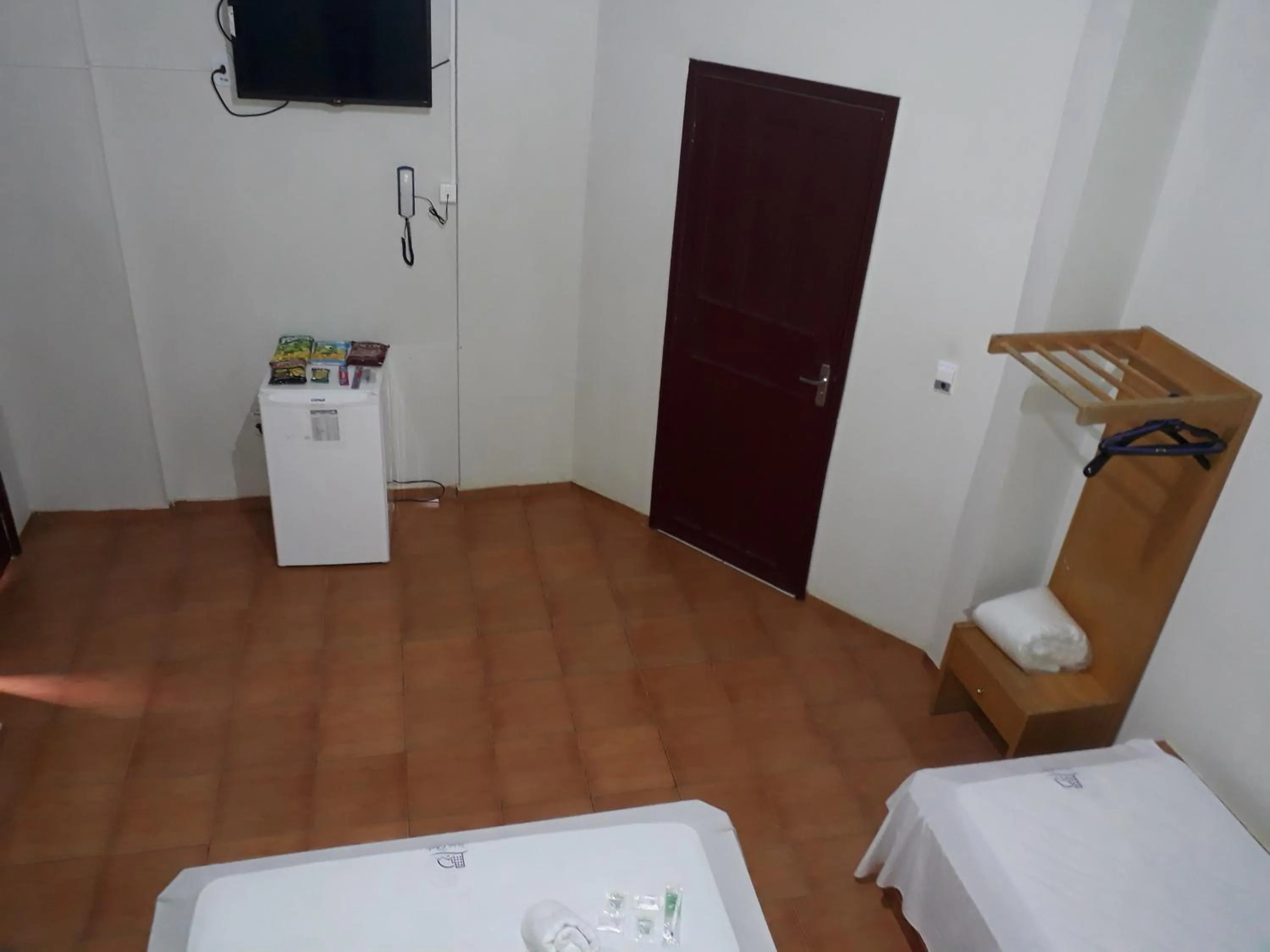 Living room, Bed in Hotel Chalé Ji-Parana