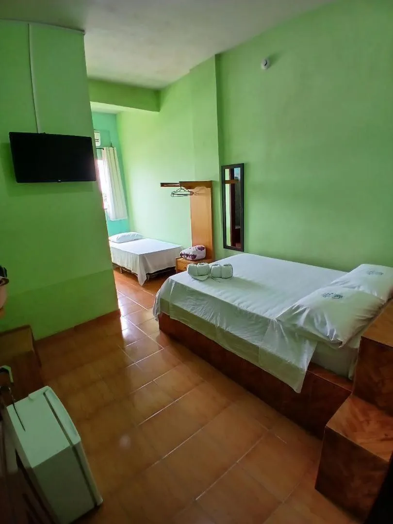 Bed in Hotel Chalé Ji-Parana