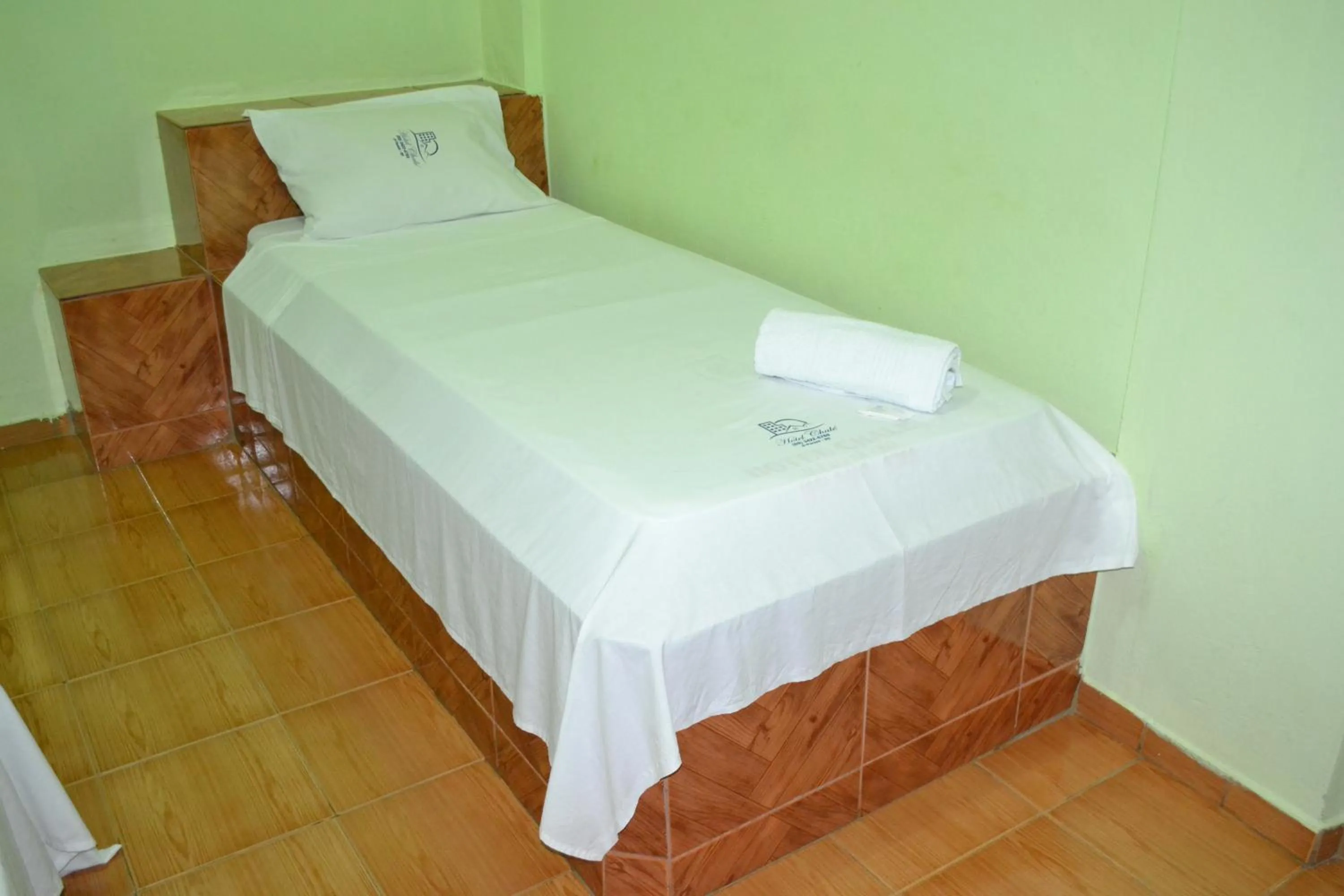 Bed in Hotel Chalé Ji-Parana