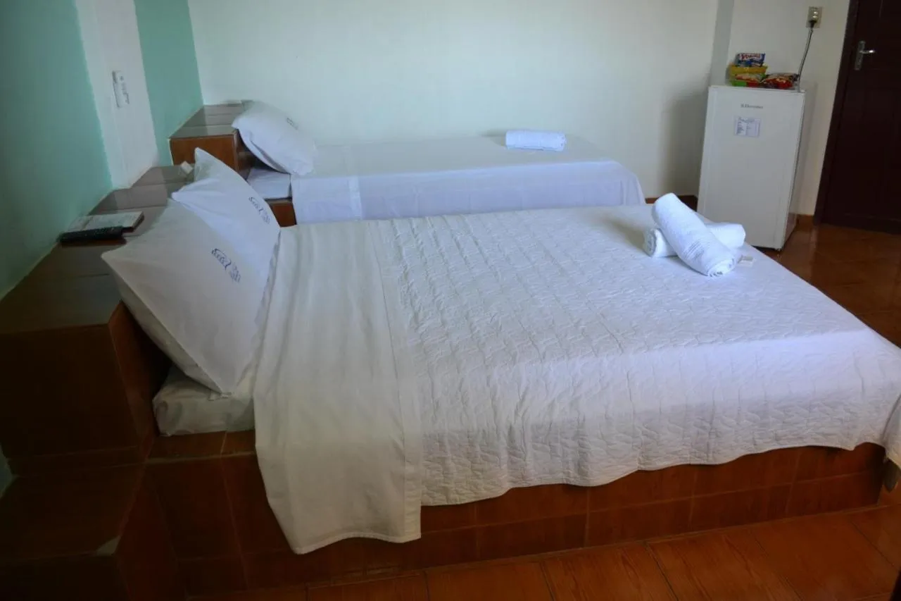 Bed in Hotel Chalé Ji-Parana