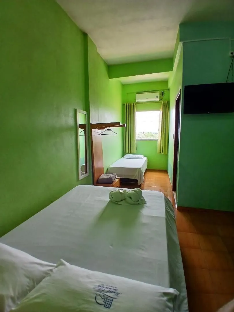 Bed in Hotel Chalé Ji-Parana