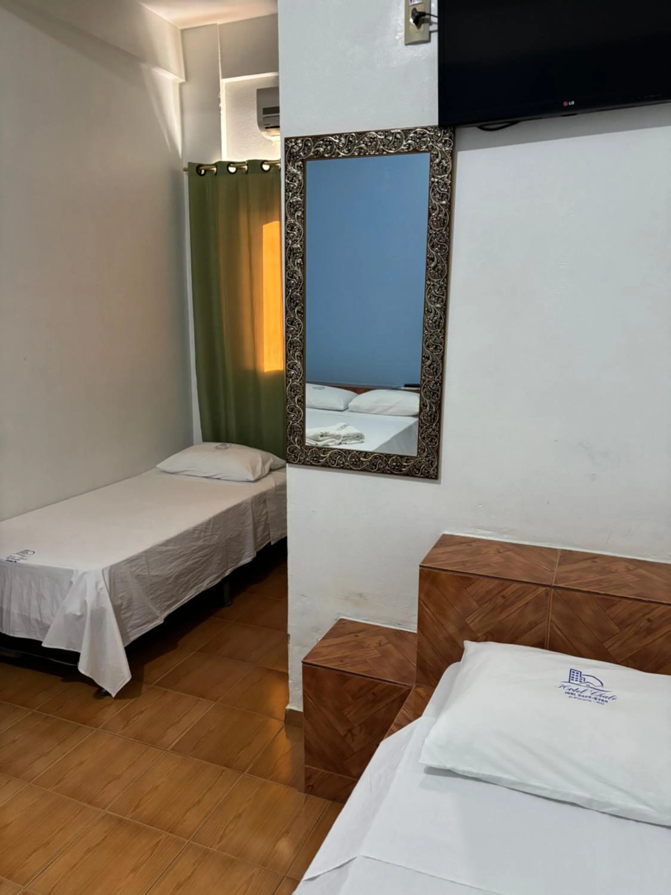 Bed in Hotel Chalé Ji-Parana