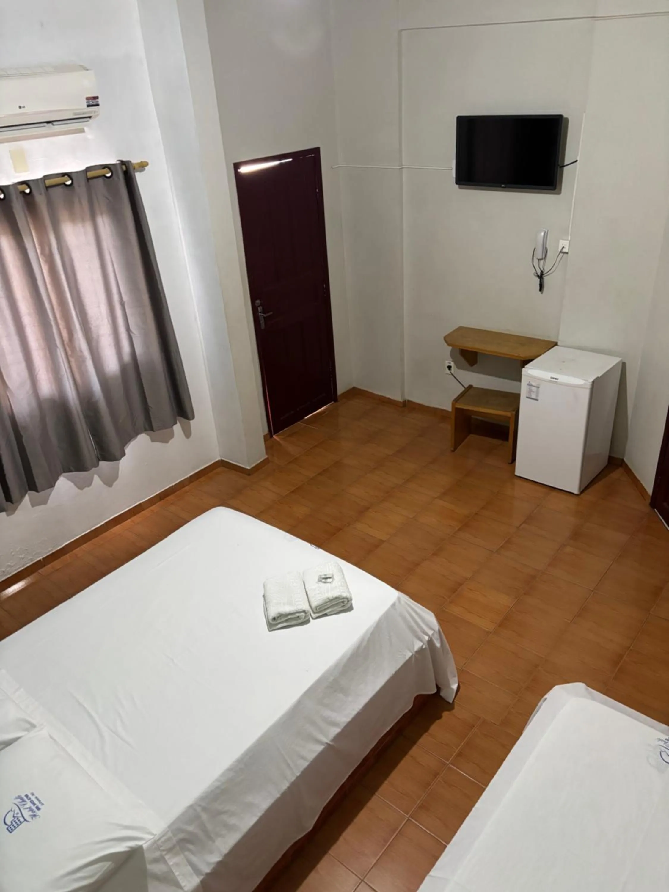 Bed in Hotel Chalé Ji-Parana