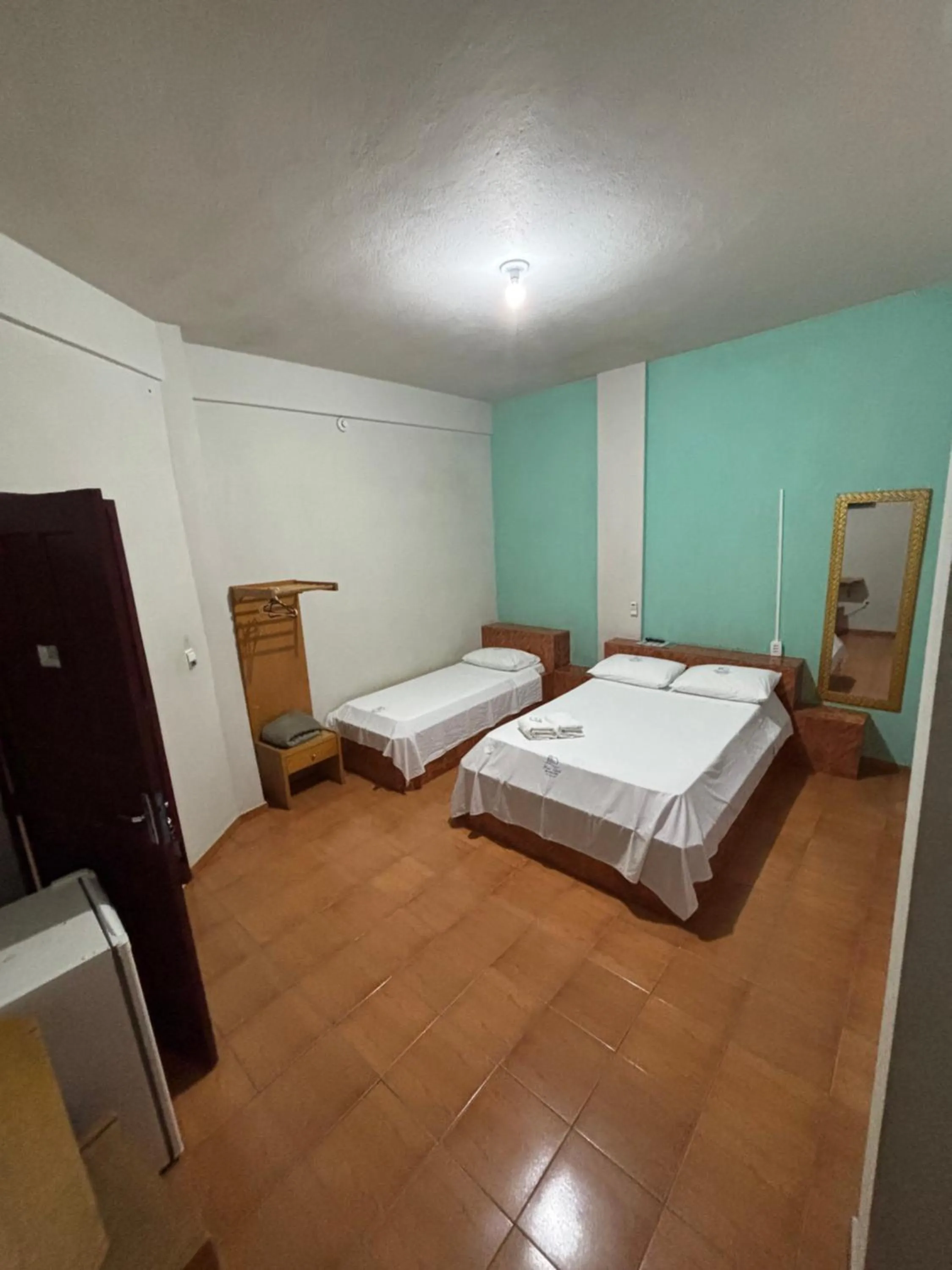 Bed in Hotel Chalé Ji-Parana