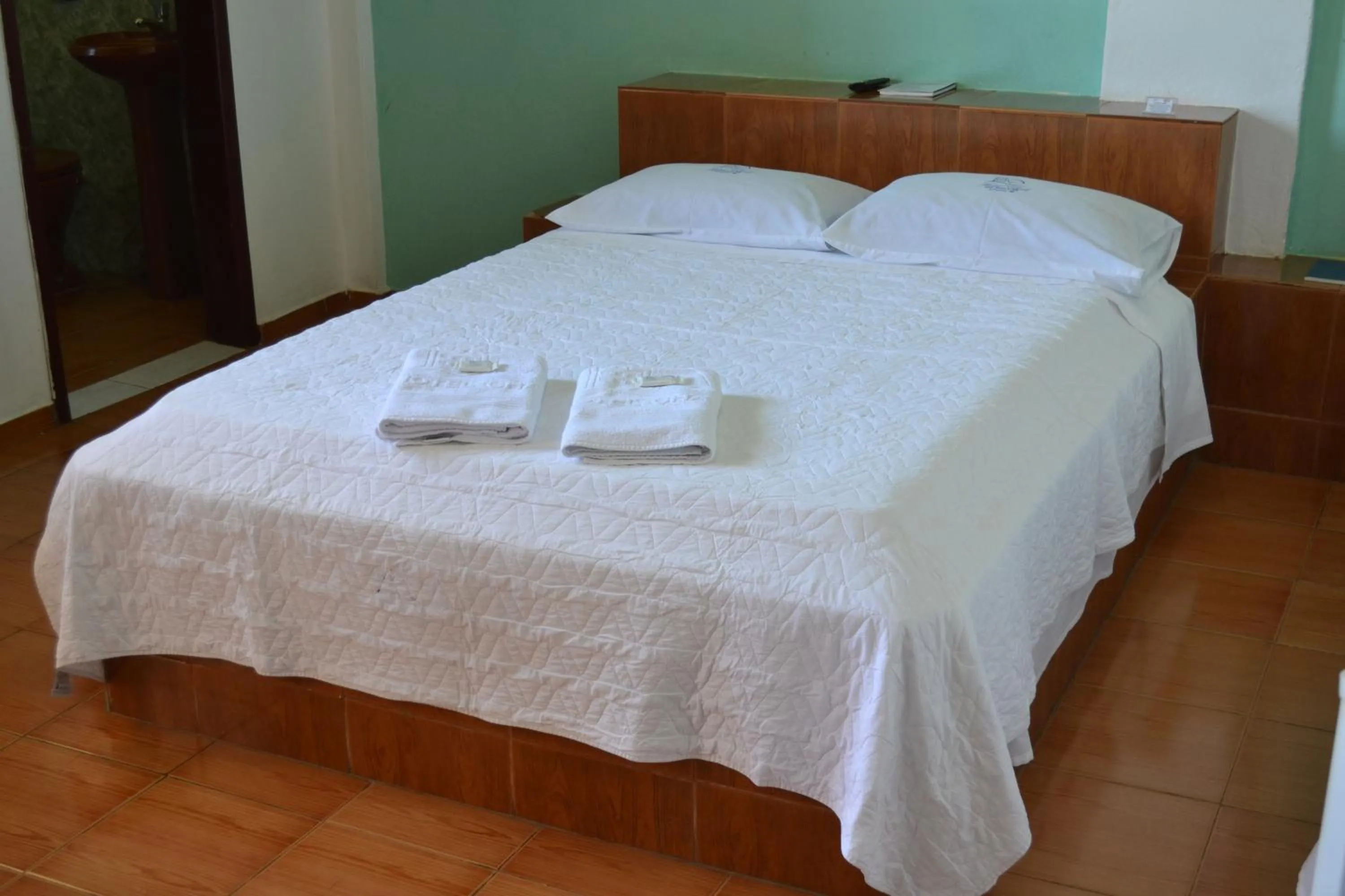 Bed in Hotel Chalé Ji-Parana
