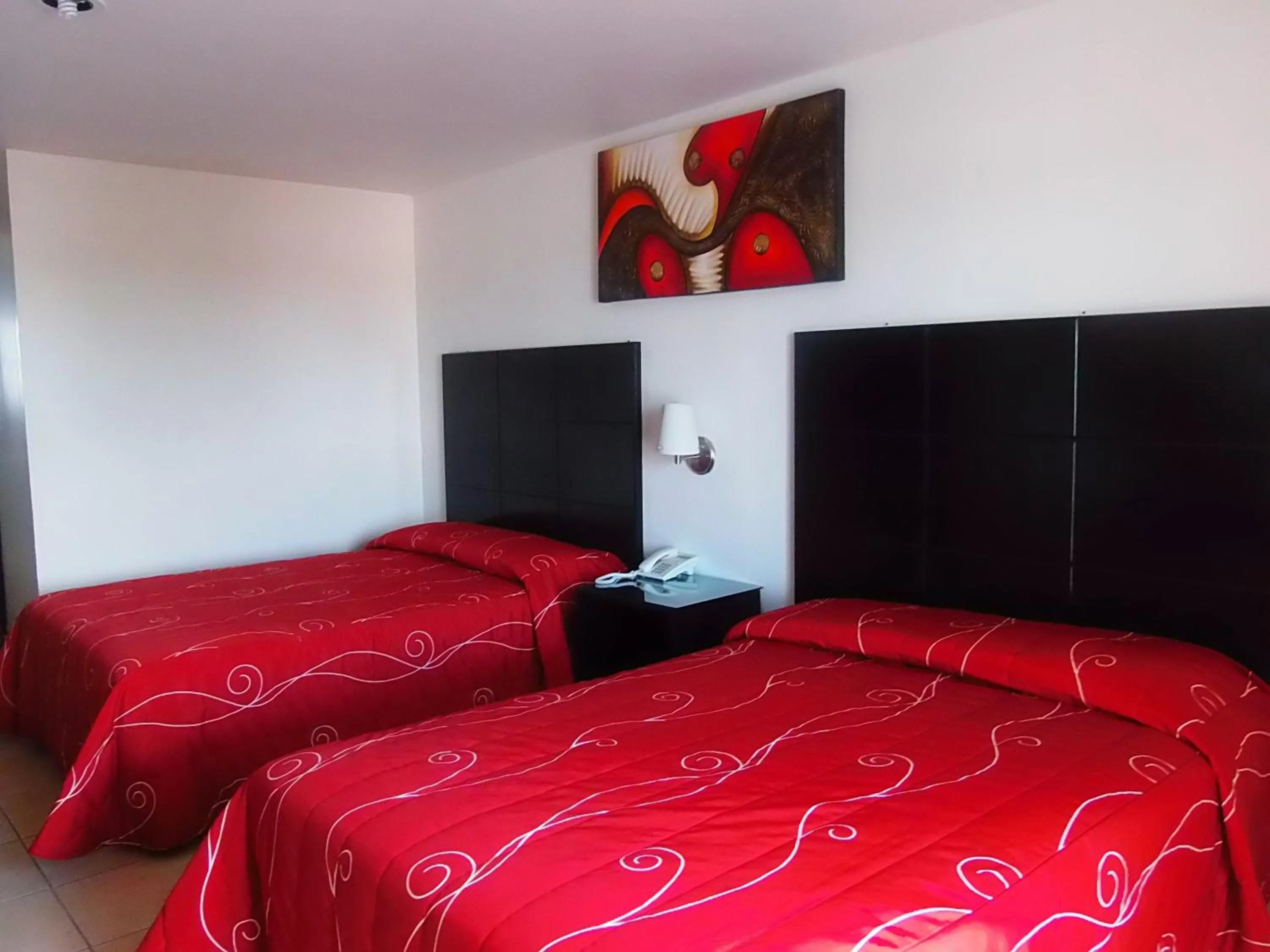 Bedroom, Bed in Hotel Raldos Inn