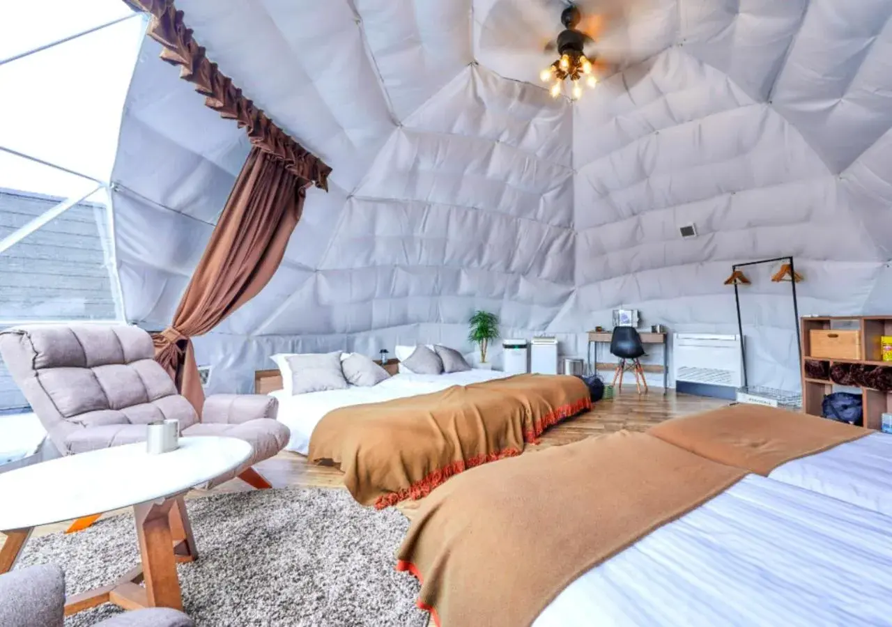 Bed in VISION GLAMPING Resort & Spa 山中湖 Bed in VISION GLAMPING Resort & Spa 山中湖