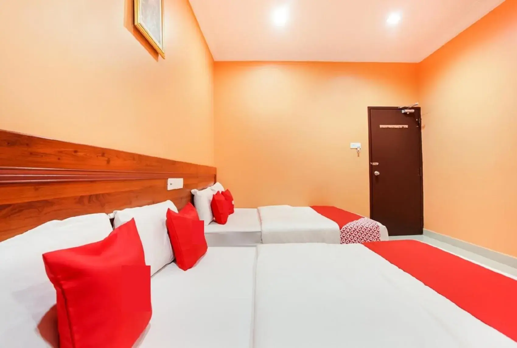 Bed in Bercam Times Inn Hotel Bed in Bercam Times Inn Hotel