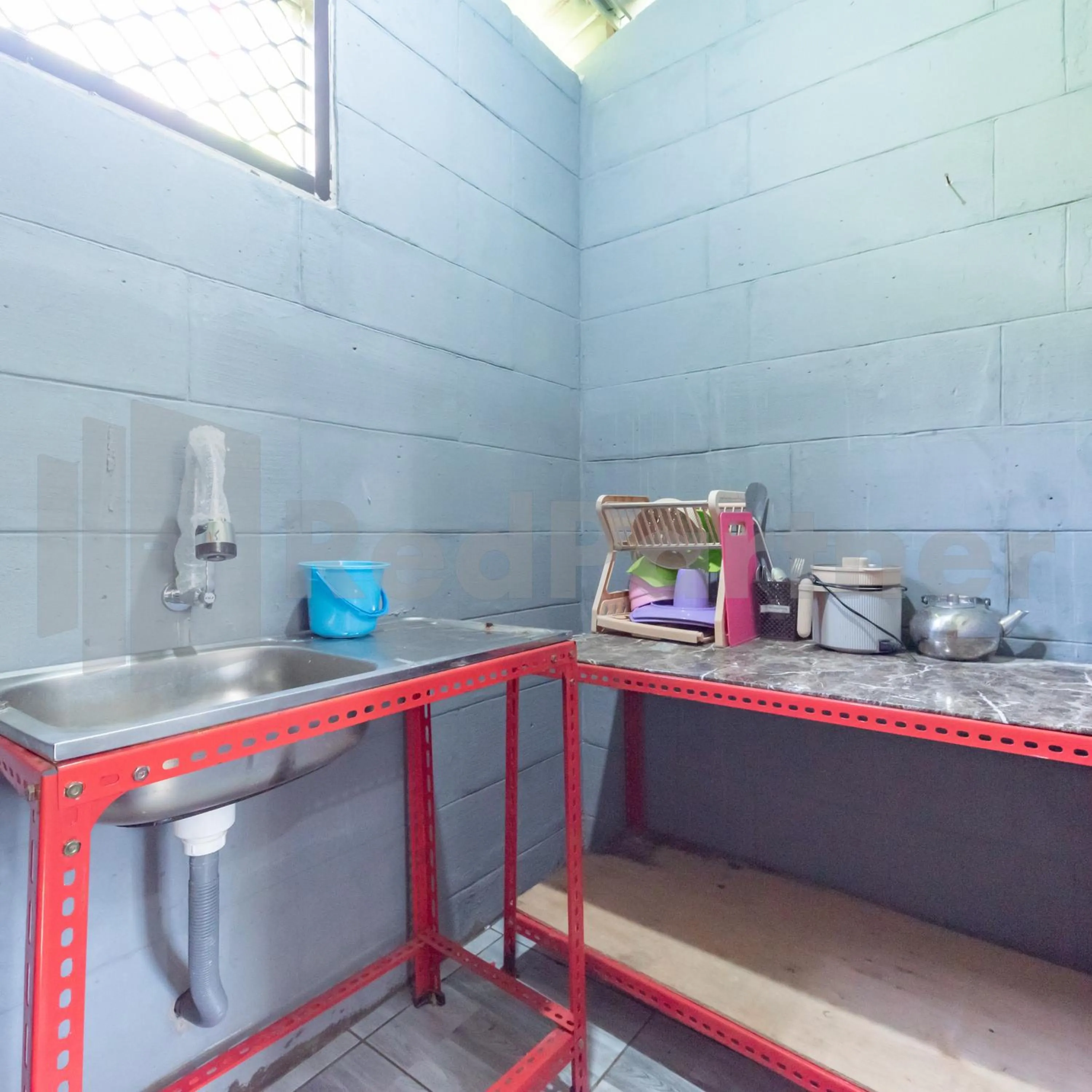 Kitchen or kitchenette in Pesona Endah Alam Hijau Wanayasa RedPartner