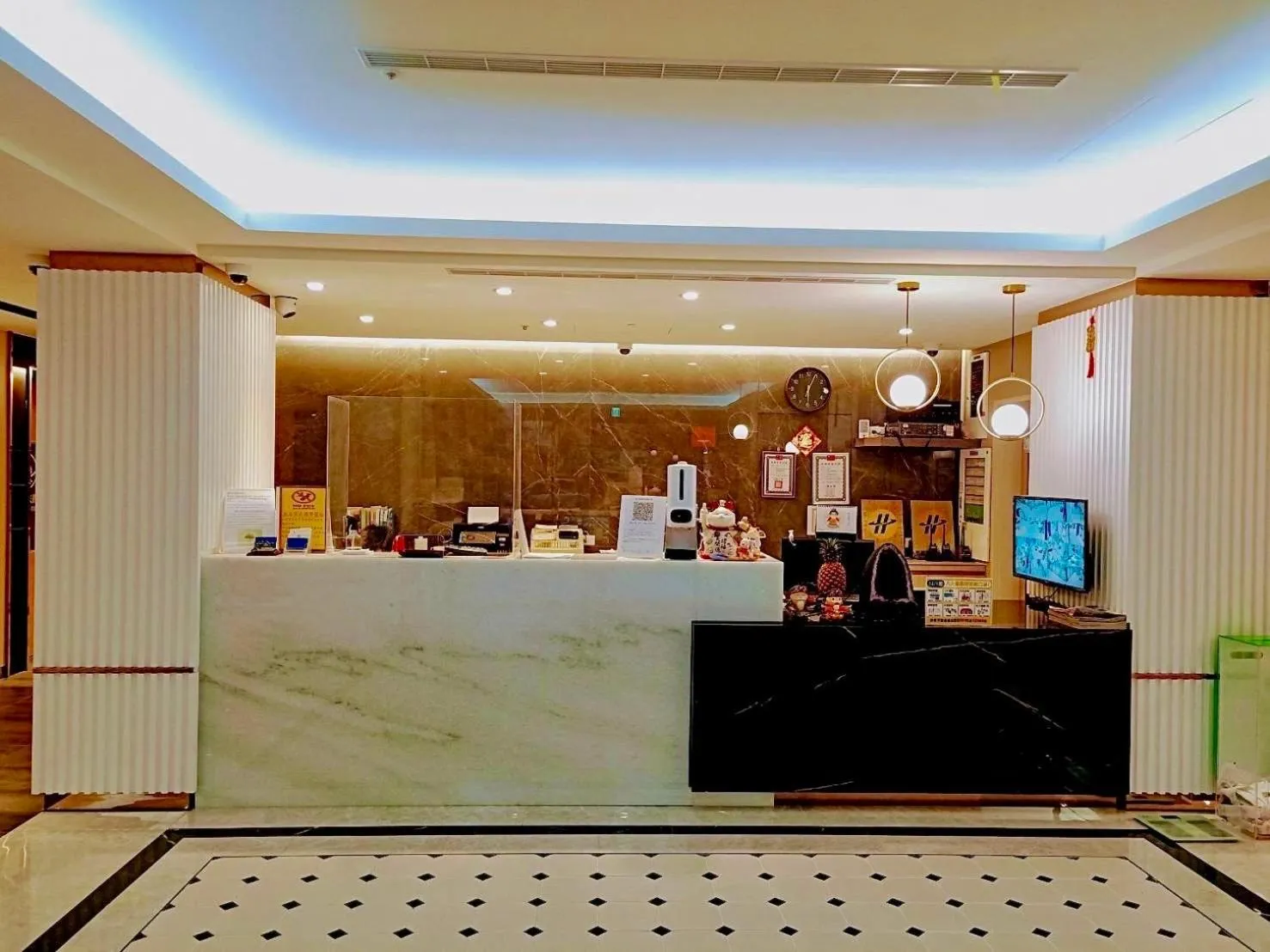 Lobby or reception in Benz Hotel