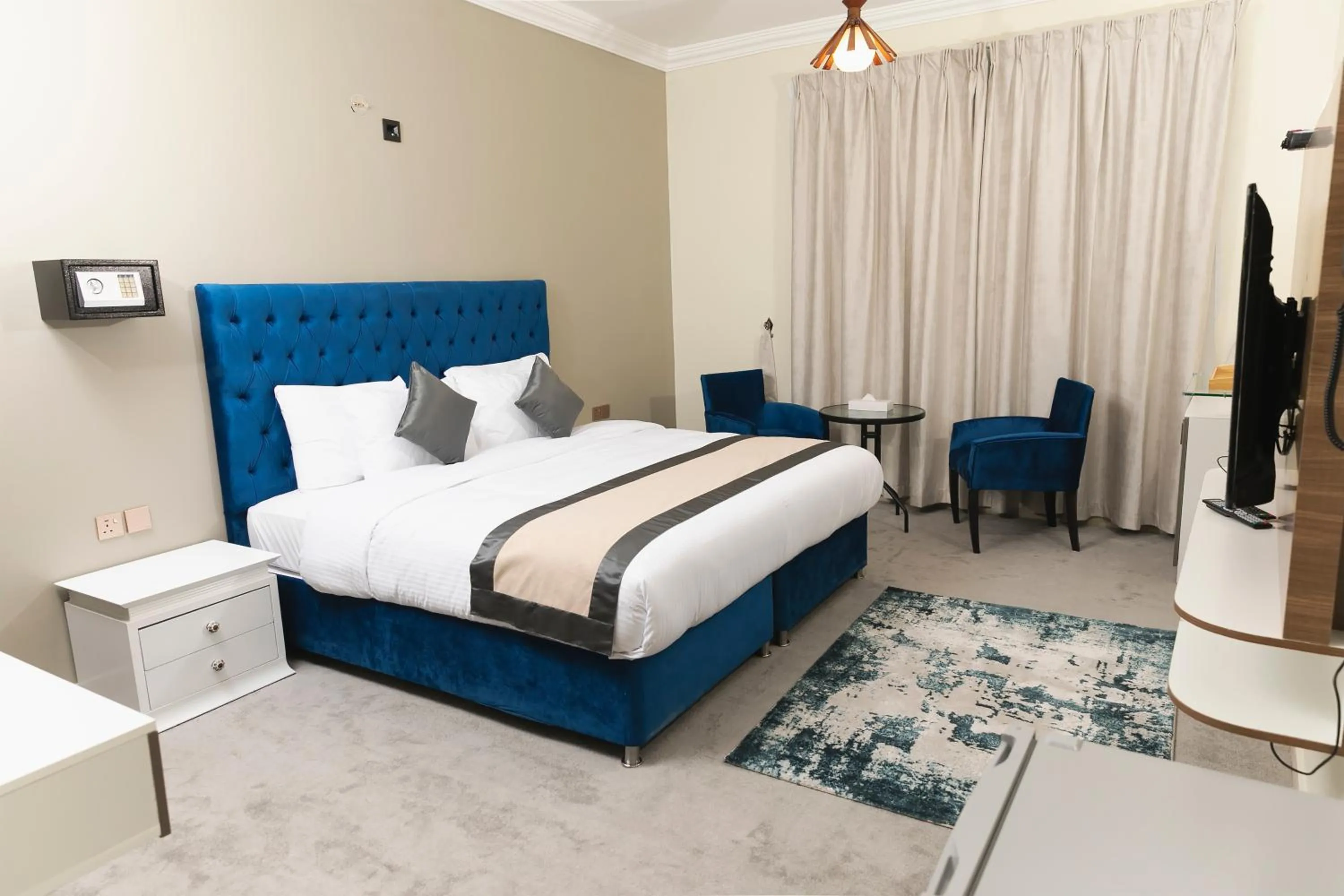 Bed in Sea Shore Hotel Apartment Khorfakkan