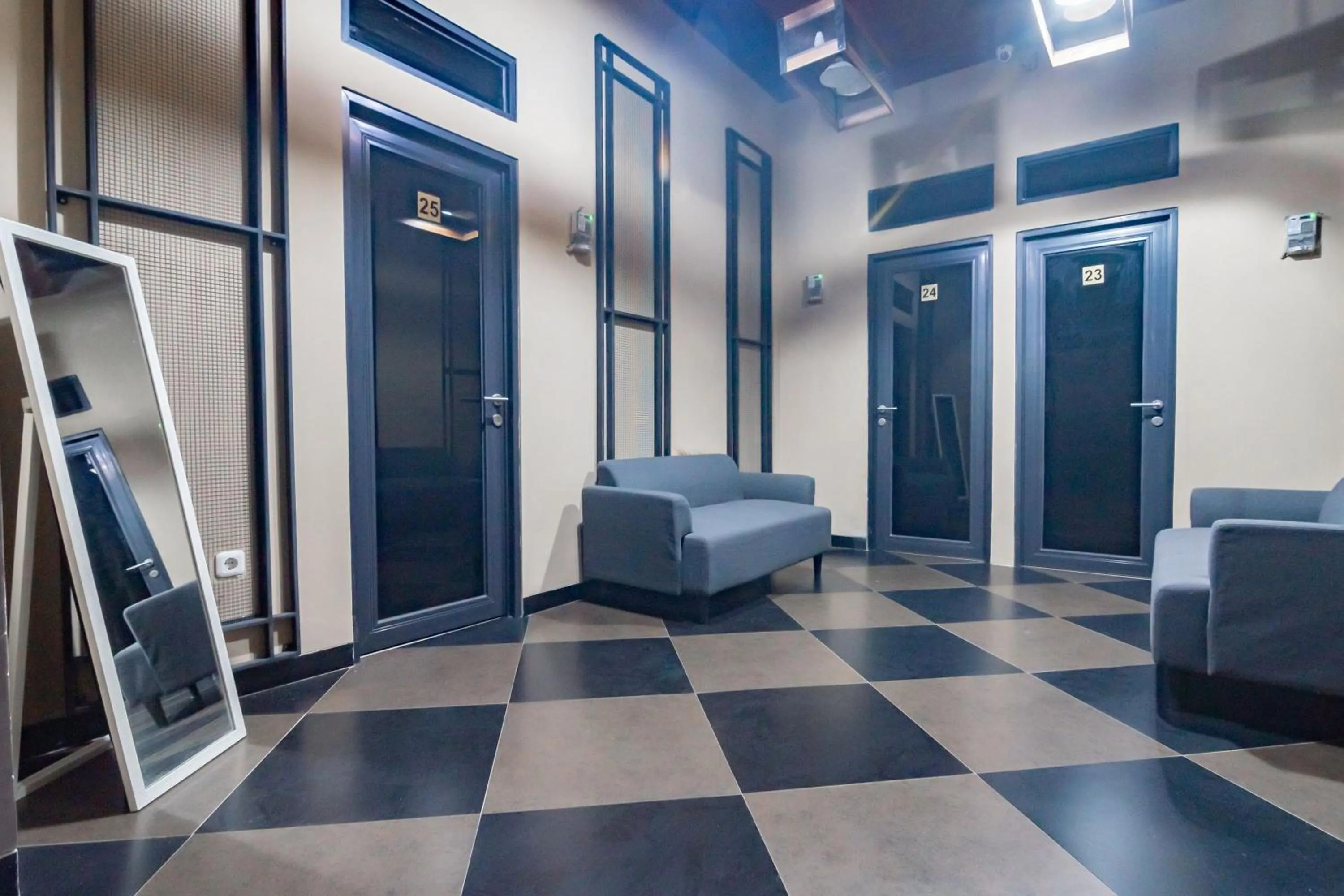 Living room in Urbanview Elephant Eleven Residence Buah Batu Bandung by RedDoorz